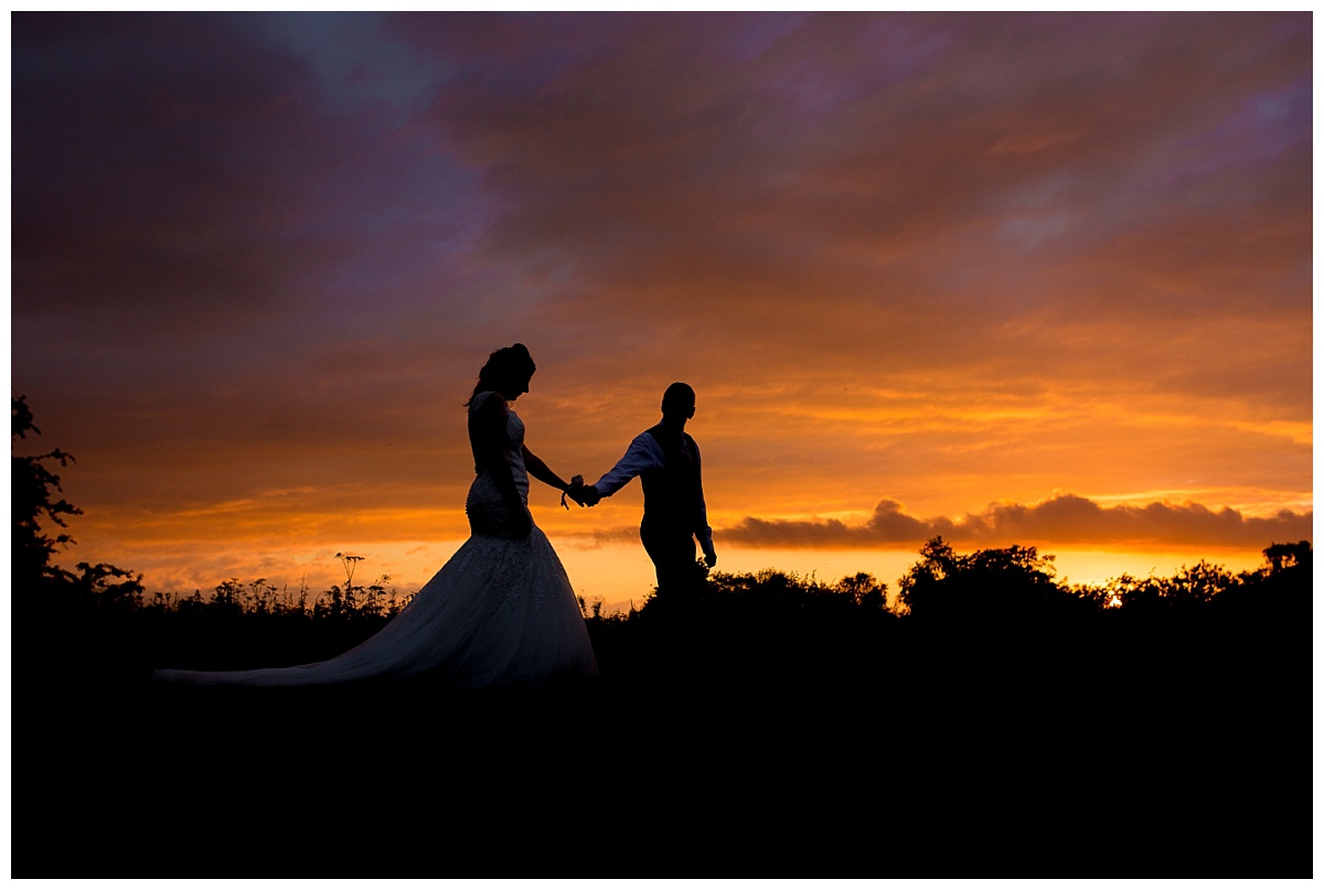 Sunset with bride and groom