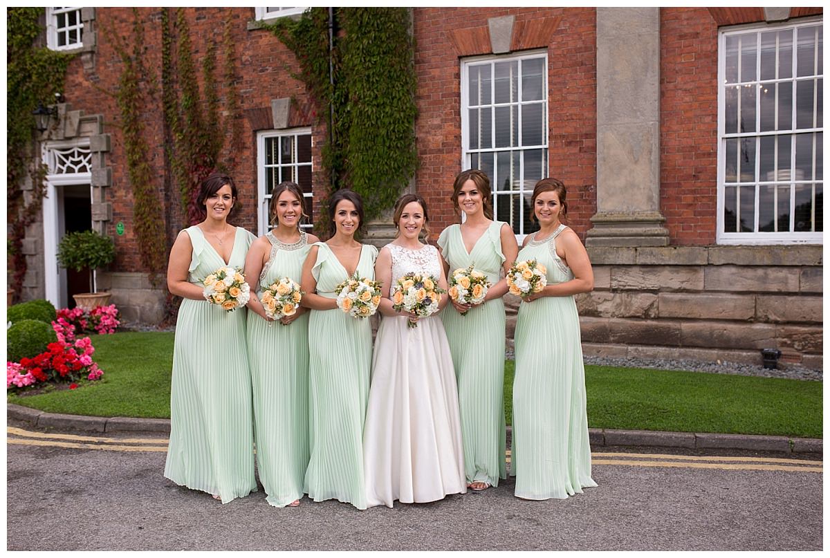 Bride and bridesmaids outside Mottram Hall
