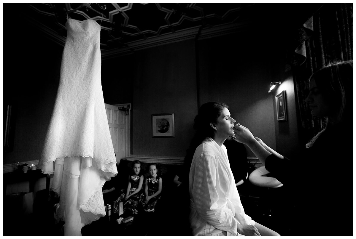 Bride having her make up applied at Crewe Hall