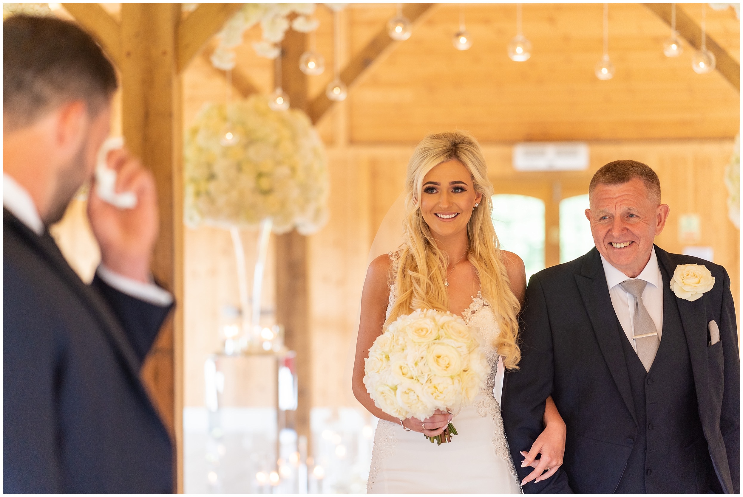 Bride and her father walking down the aisle at Merrydale Manor