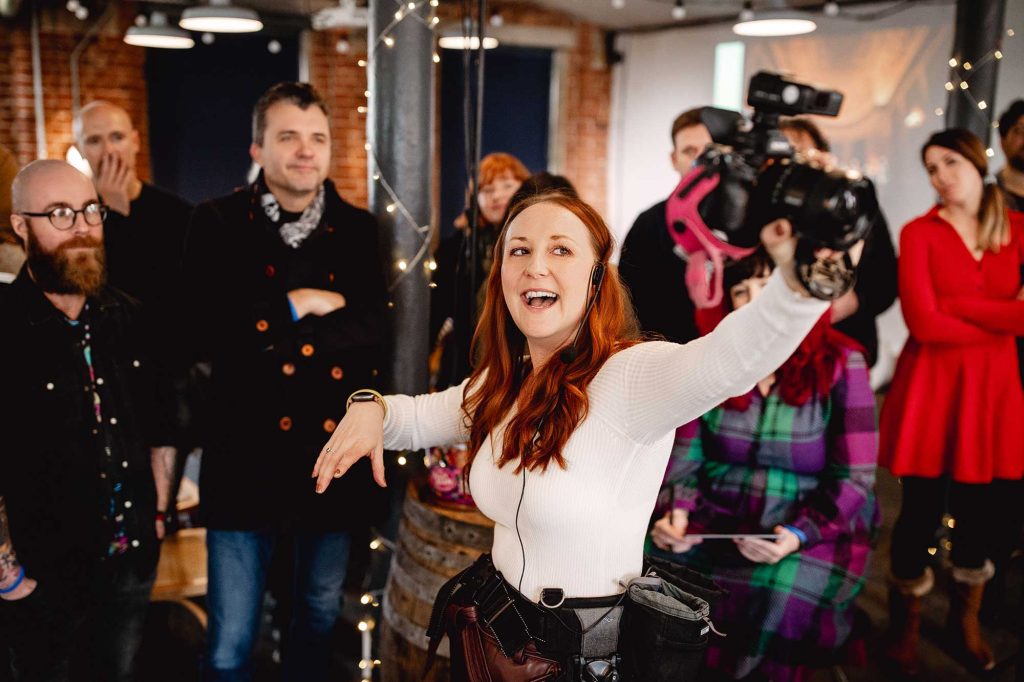 Helen Williams teaching an off-camera flash workshop to a room of wedding photographers