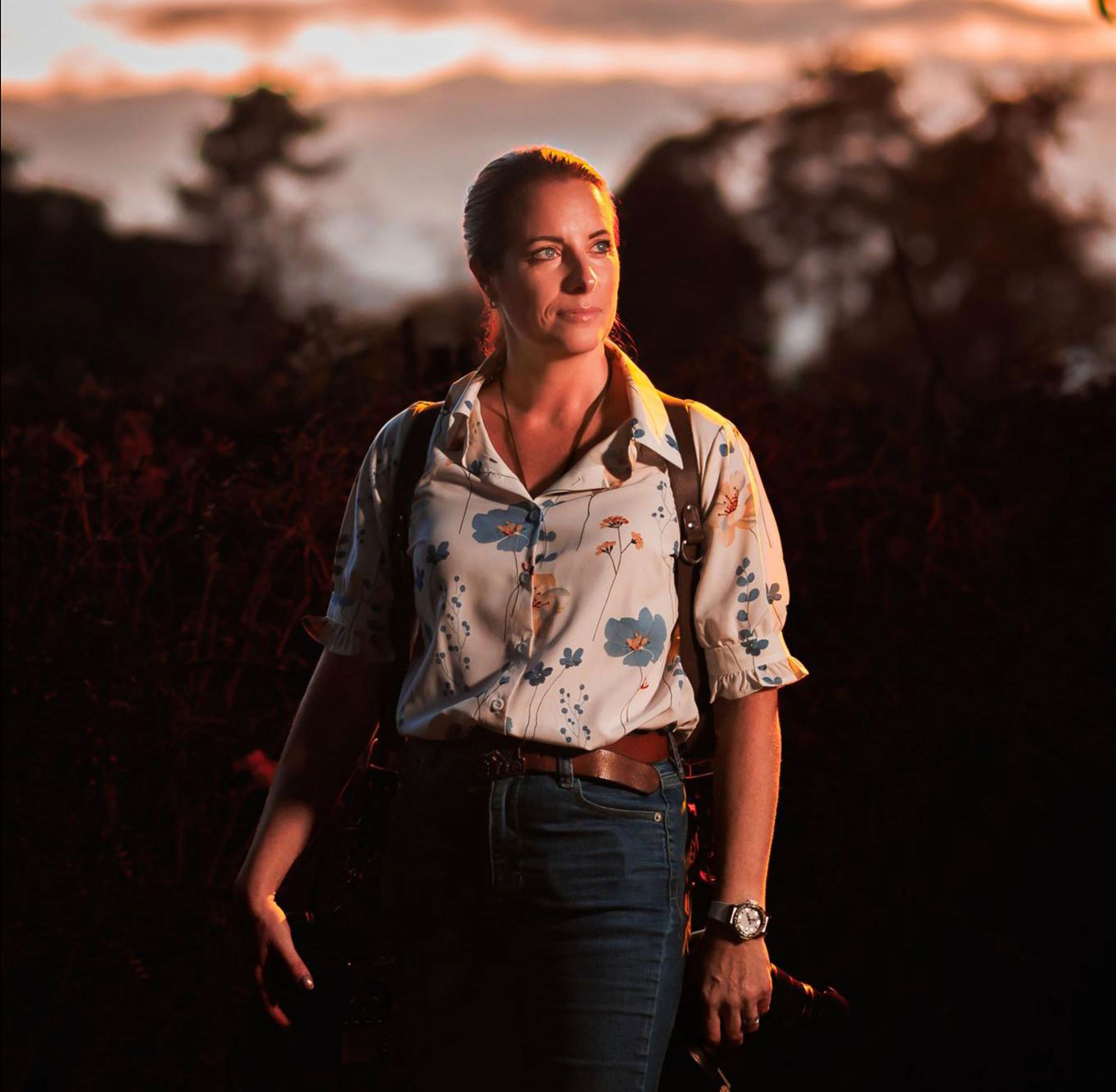 Portrait of Rowena, photographer, taken outdoors at golden hour