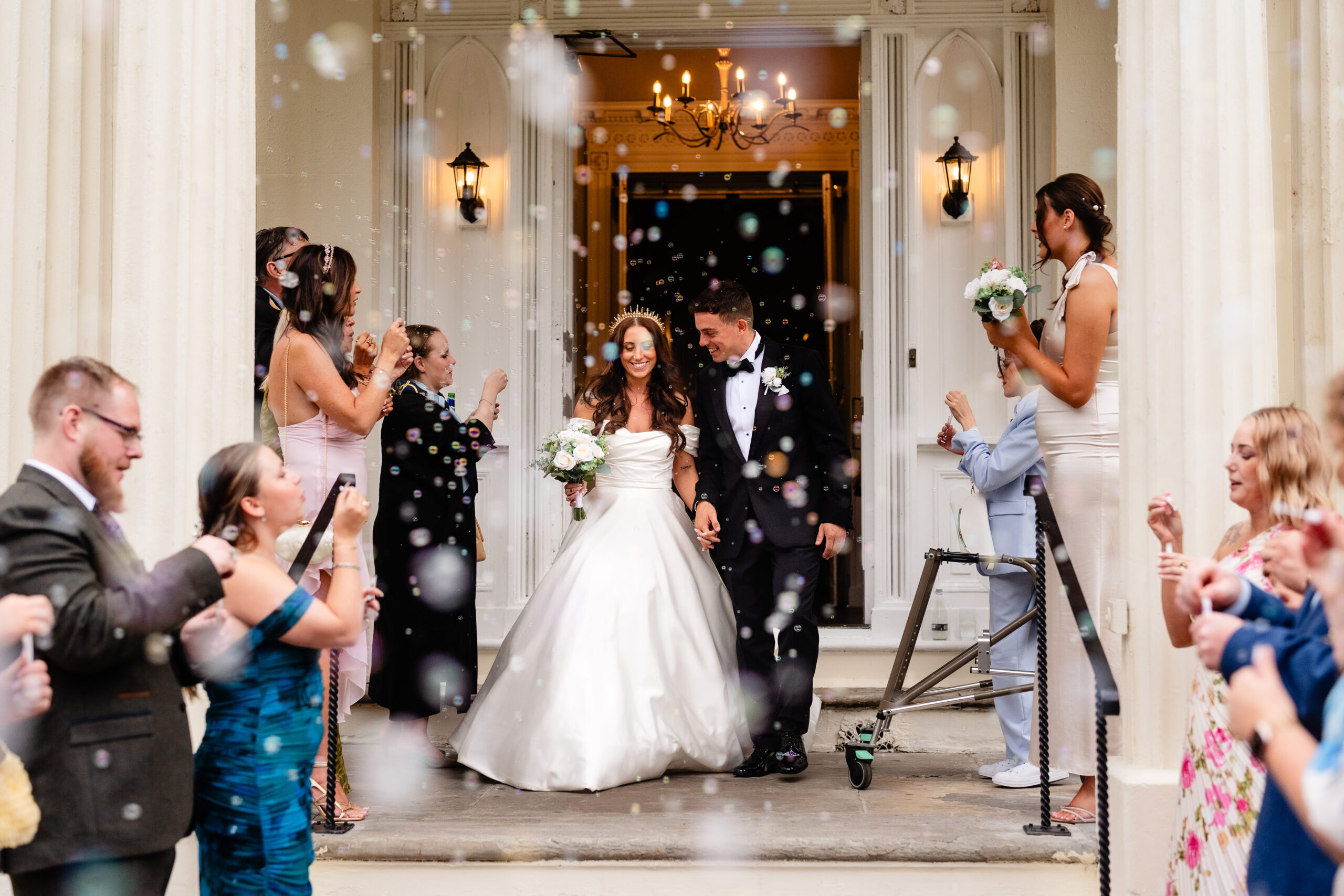 Bubble exit celebration outside Rainhill Hall wedding venue