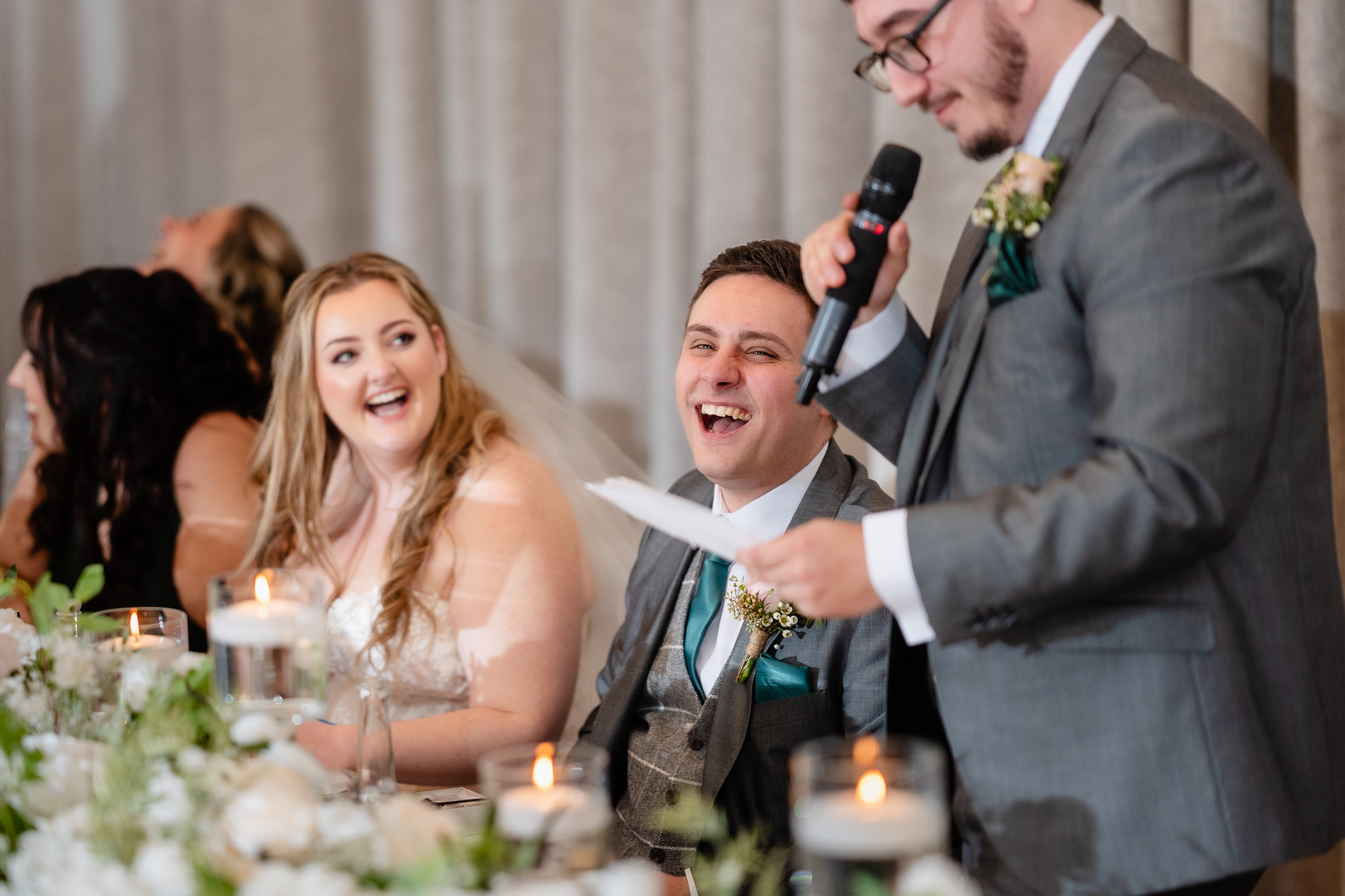 Best man’s speech with the groom laughing at Merrydale Manor wedding reception