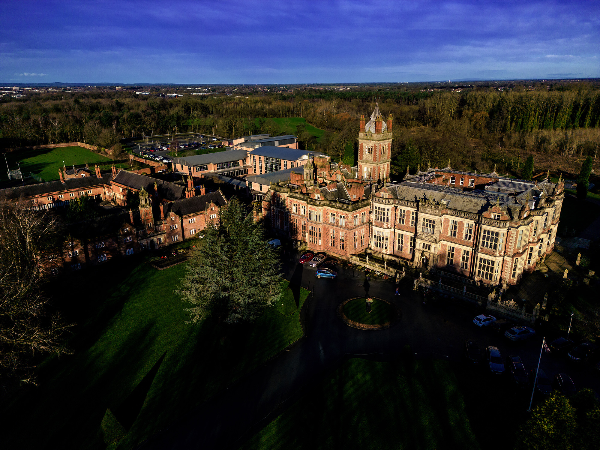 Crewe Hall glowing in the dark early hours of the morning, ahead of John and Neill's wedding, Cheshire wedding photographer