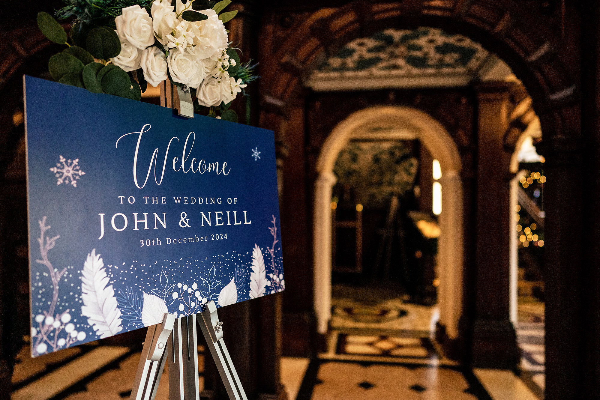 A welcome sign for John and Neill's wedding day at Crewe Hall