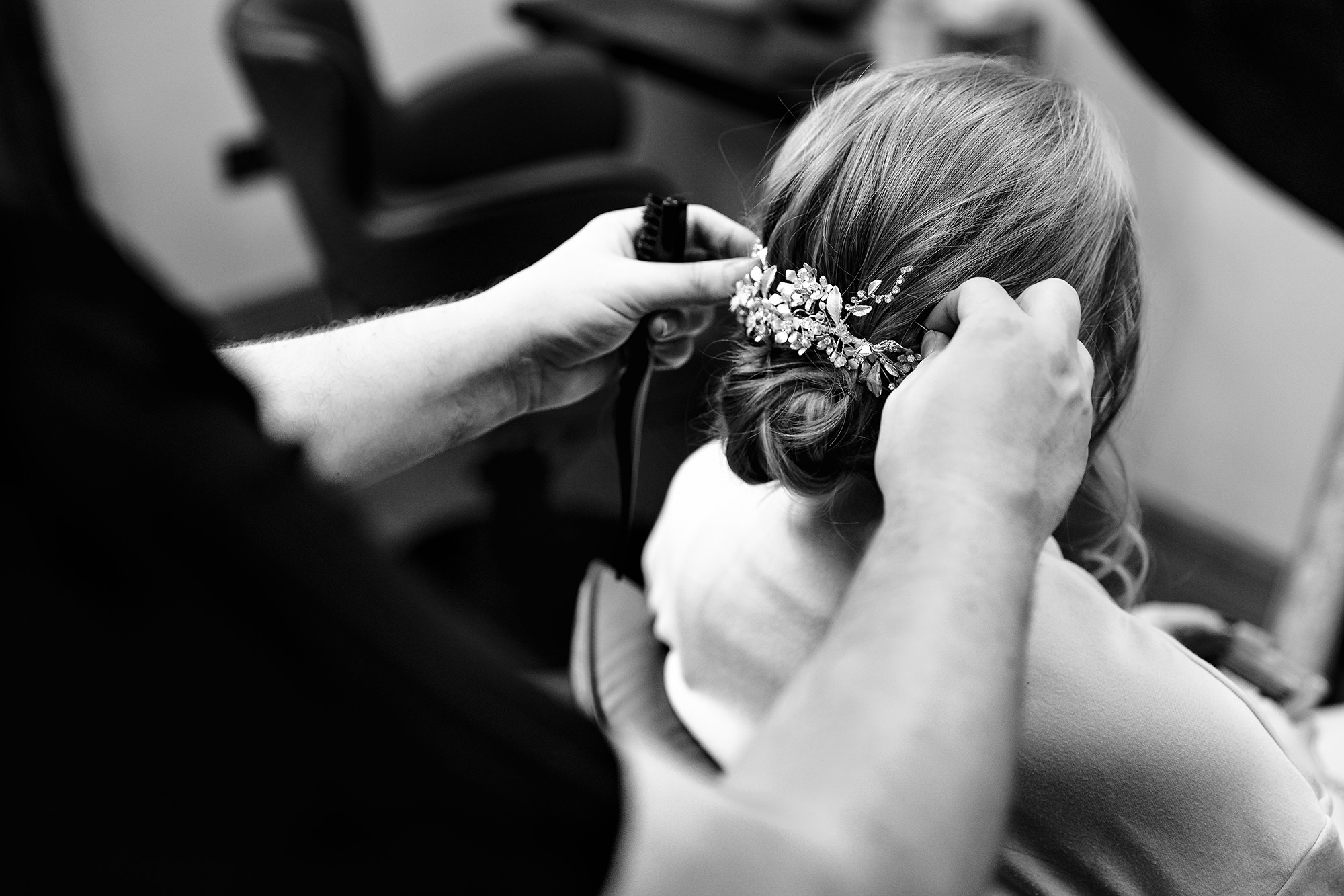 Joseph Michael Marchant finishing Chloe’s hair before her Salt House wedding