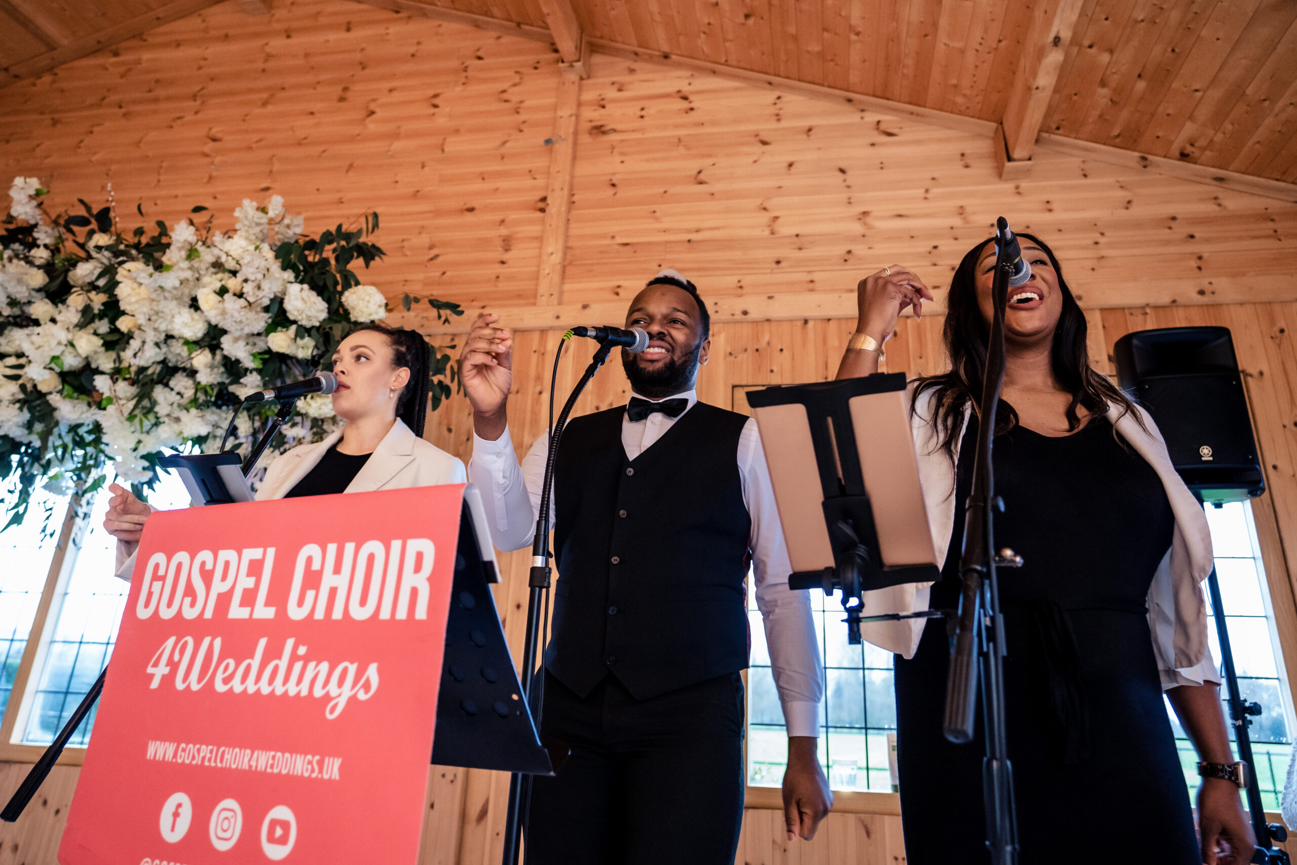 Gospel Choir 4 Weddings singing in the ceremony room before the wedding at Merrydale Manor, Cheshire wedding photographer