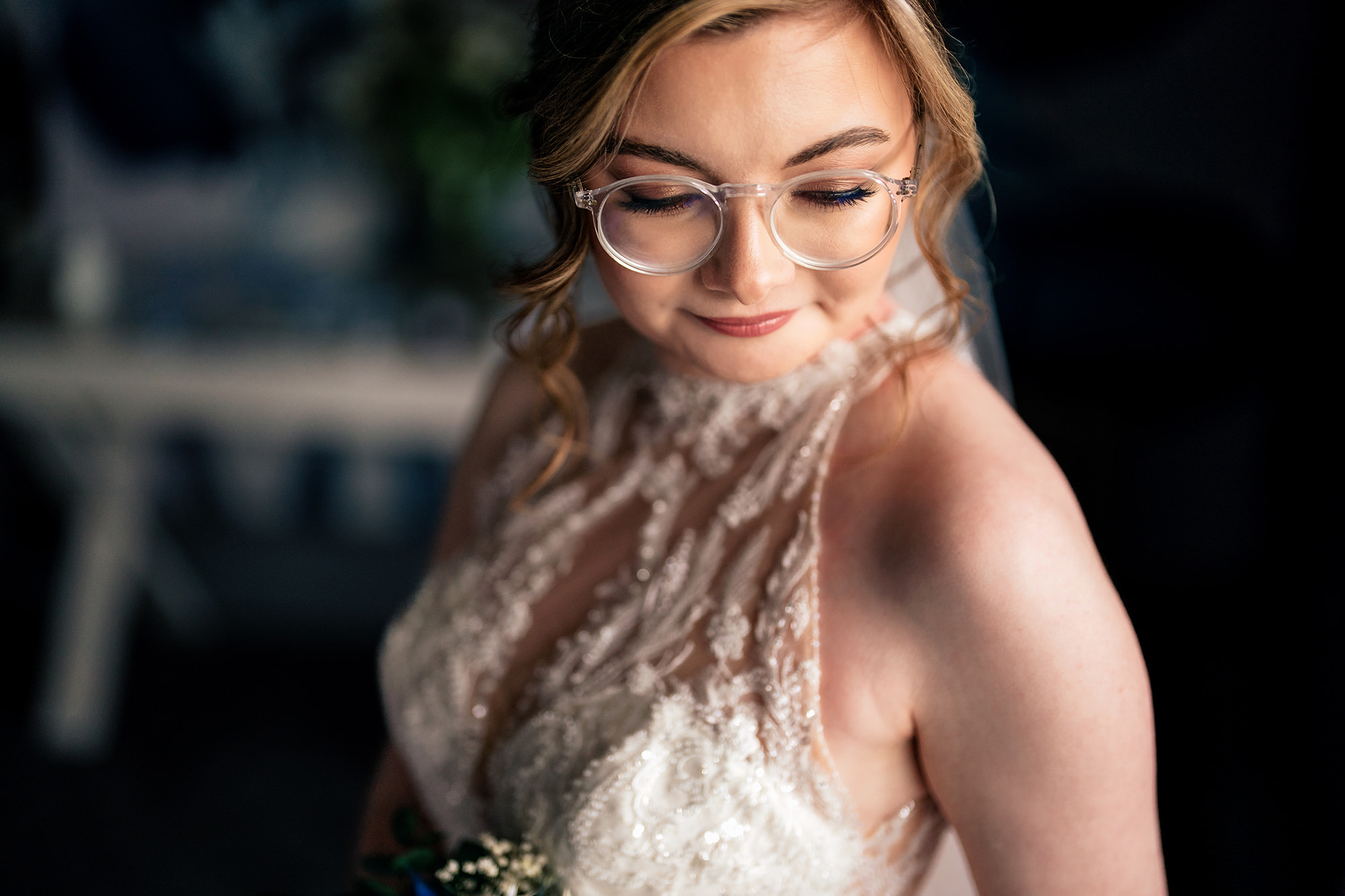 Bride pictured in soft light in the getting ready room at Salt House, Staffordshire wedding photographer