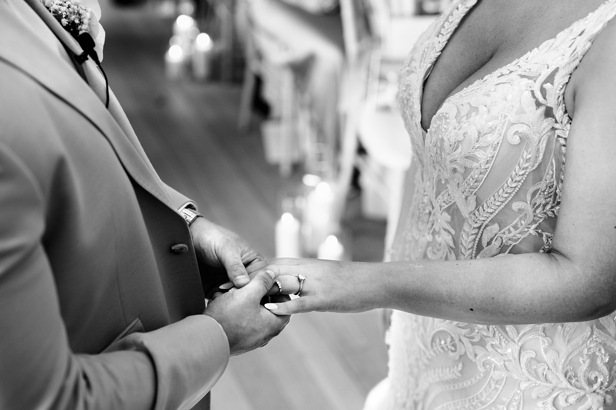 Close up of the ring exchange between Jess and Cy during their Salt House wedding ceremony