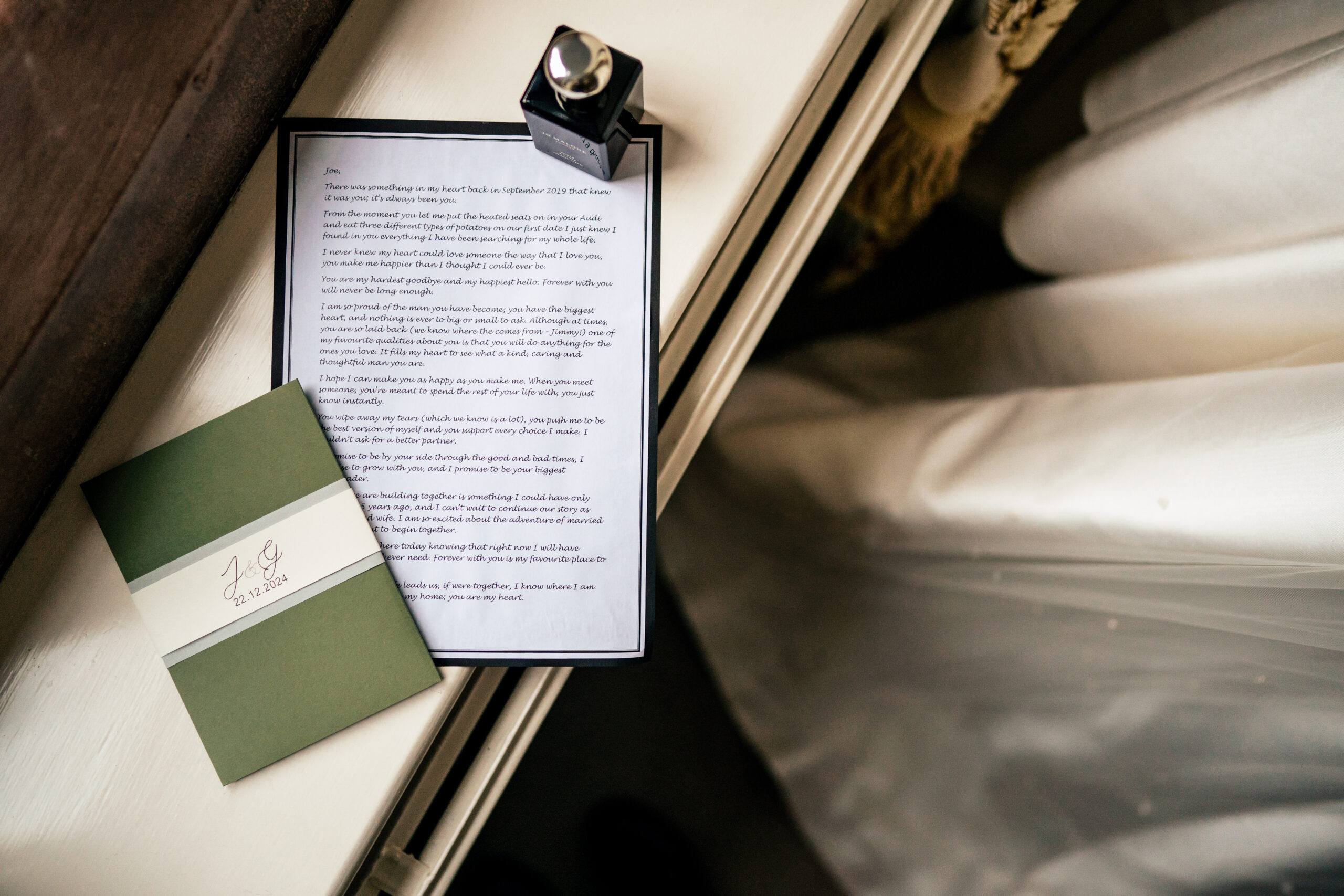A handwritten letter and a bottle of cologne waiting for Joe on the morning of the wedding