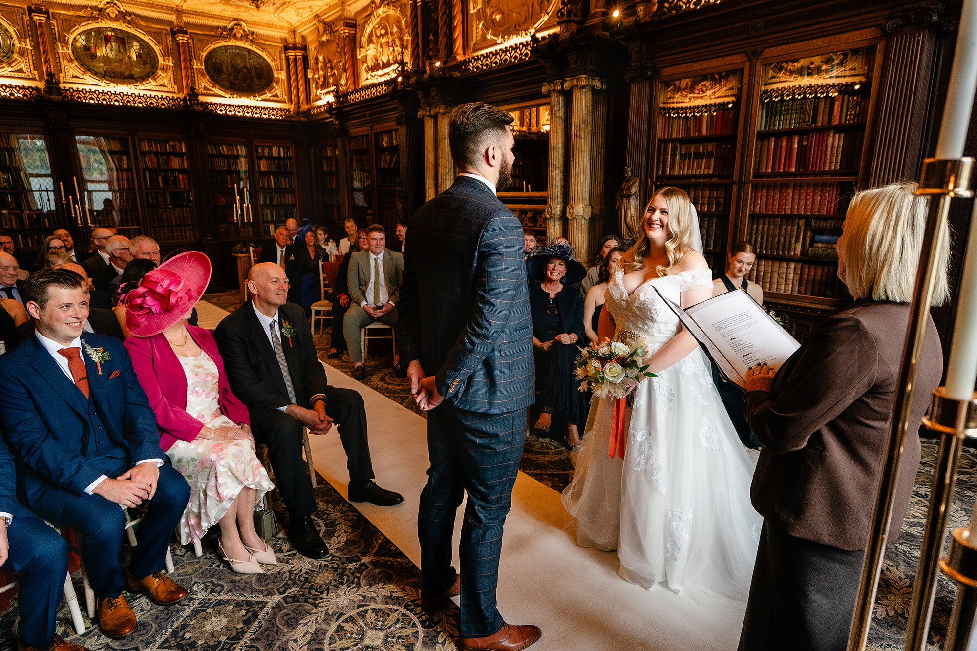 The bride’s dad walking her down the aisle at Crewe Hall, Cheshire wedding photographer
