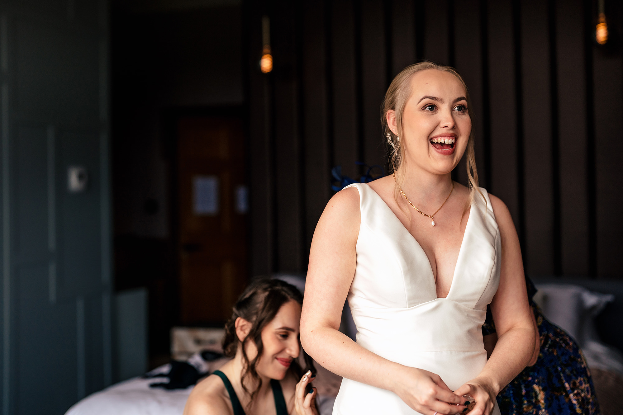 Chloe laughing, ready for the ceremony at Salt House