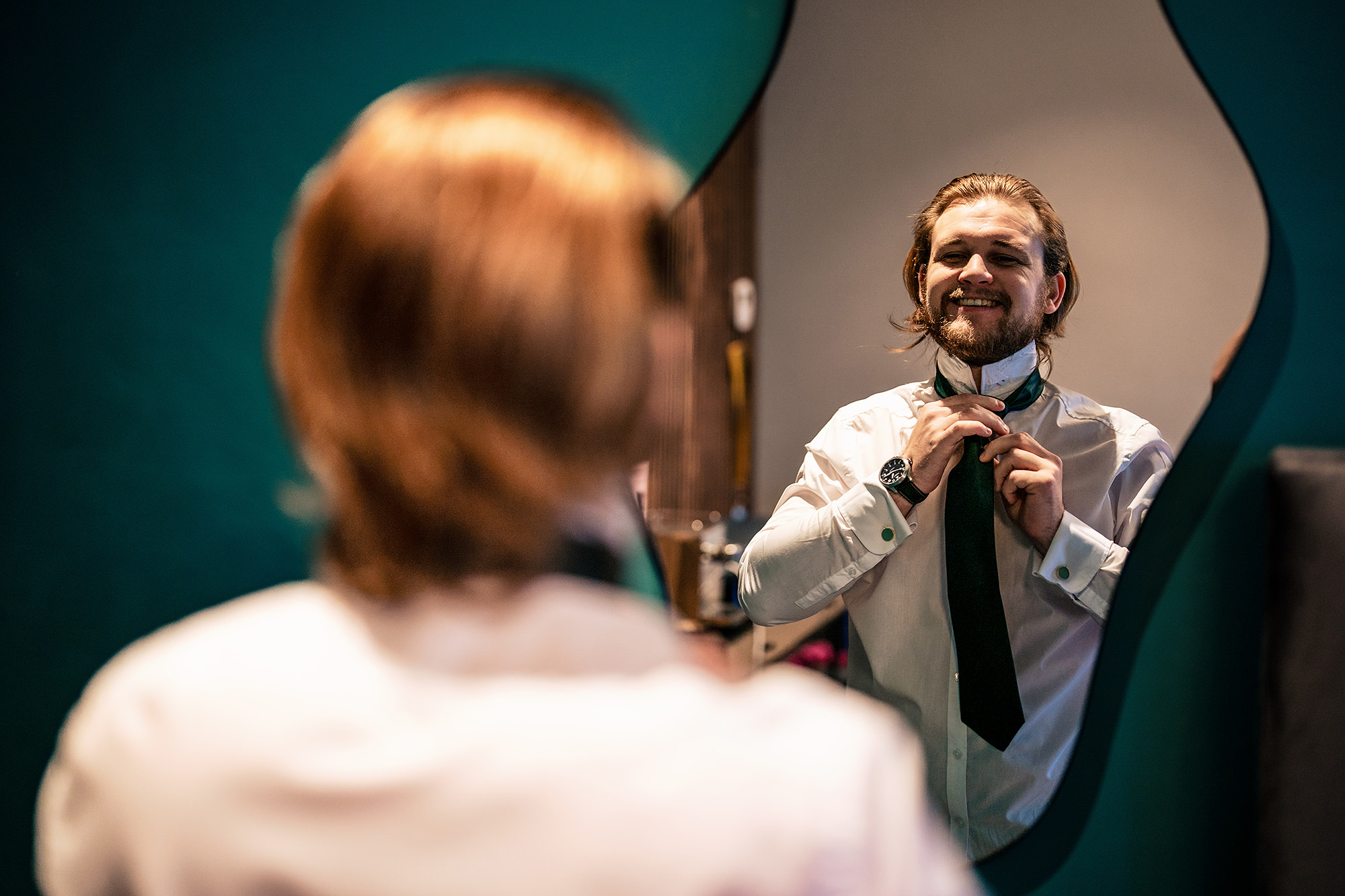 Dan tying his tie before the ceremony at Salt House