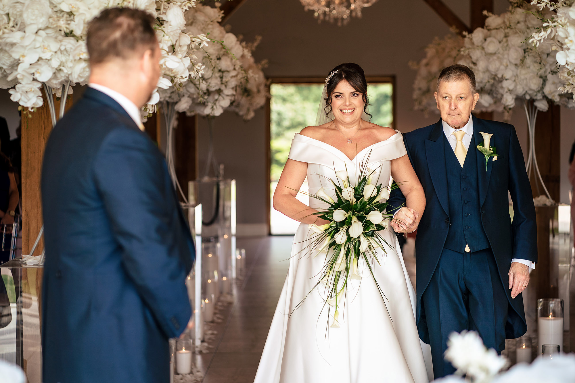 Laura and her dad walking down the aisle together, Merrydale Manor wedding photographer