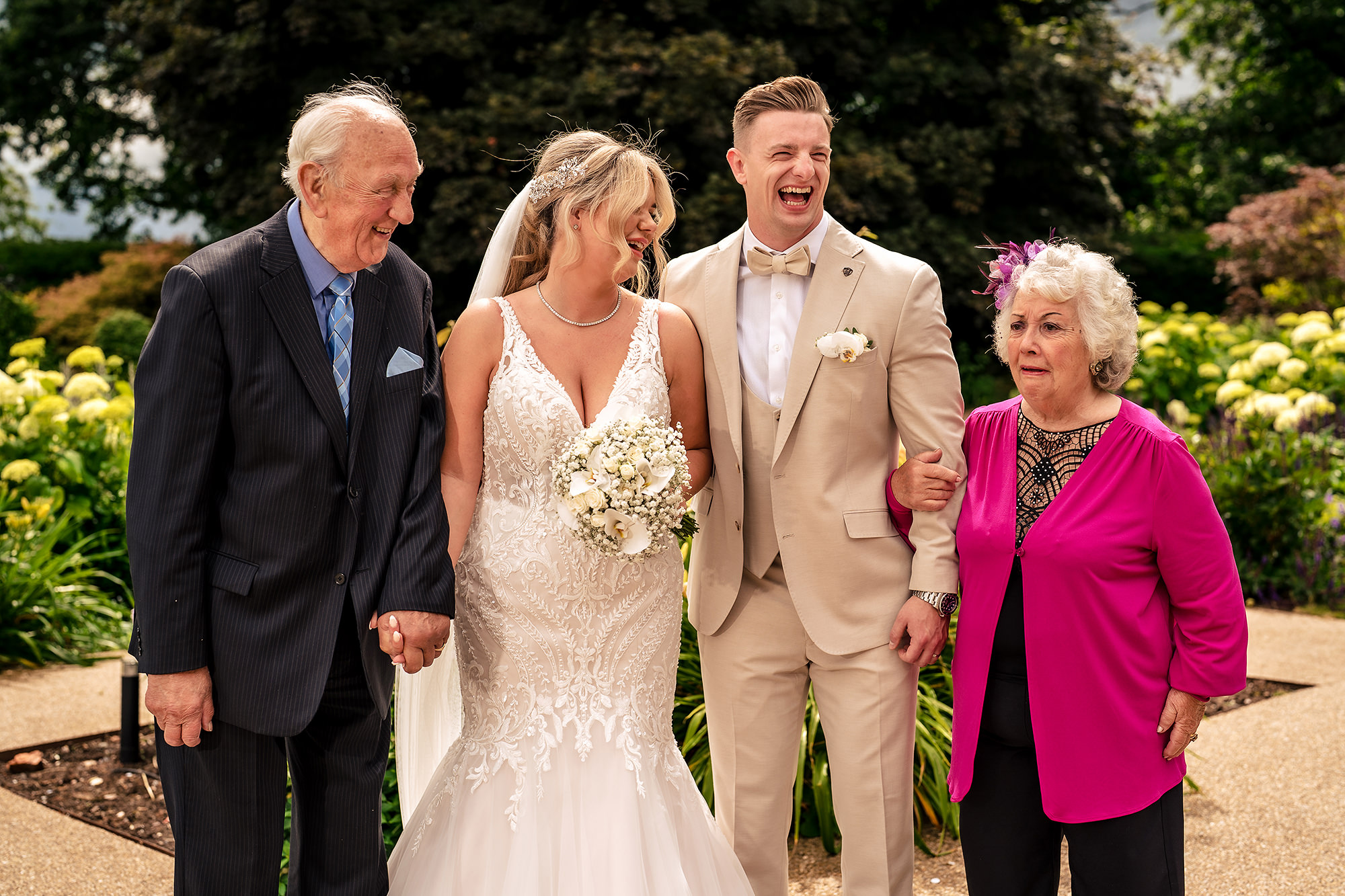 Jess and Cy with their grandparents in the gardens at Salt House, Staffordshire