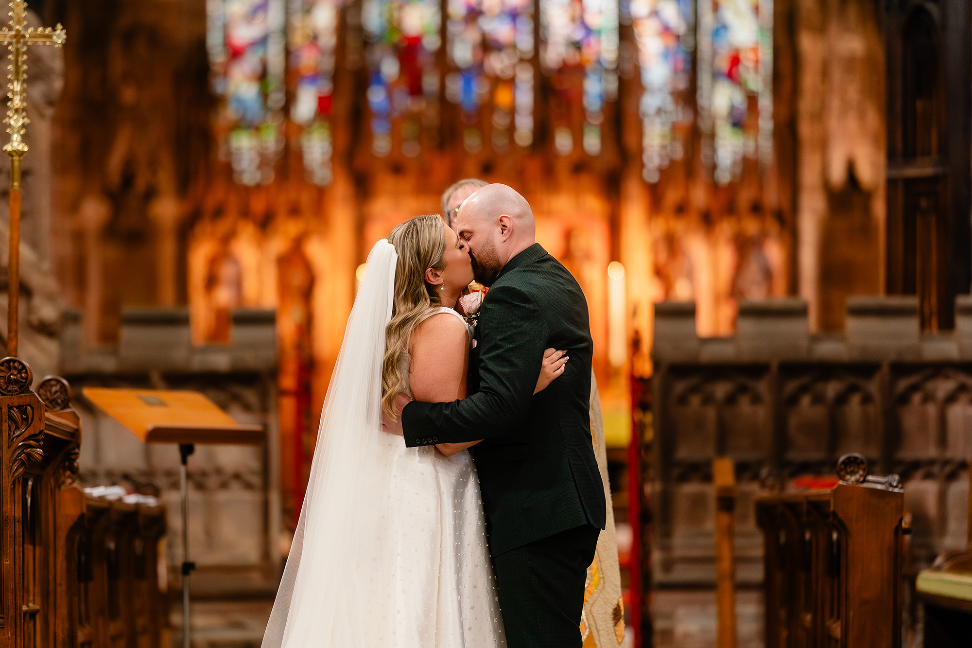 Chloe and Pete’s first kiss as a married couple at the altar