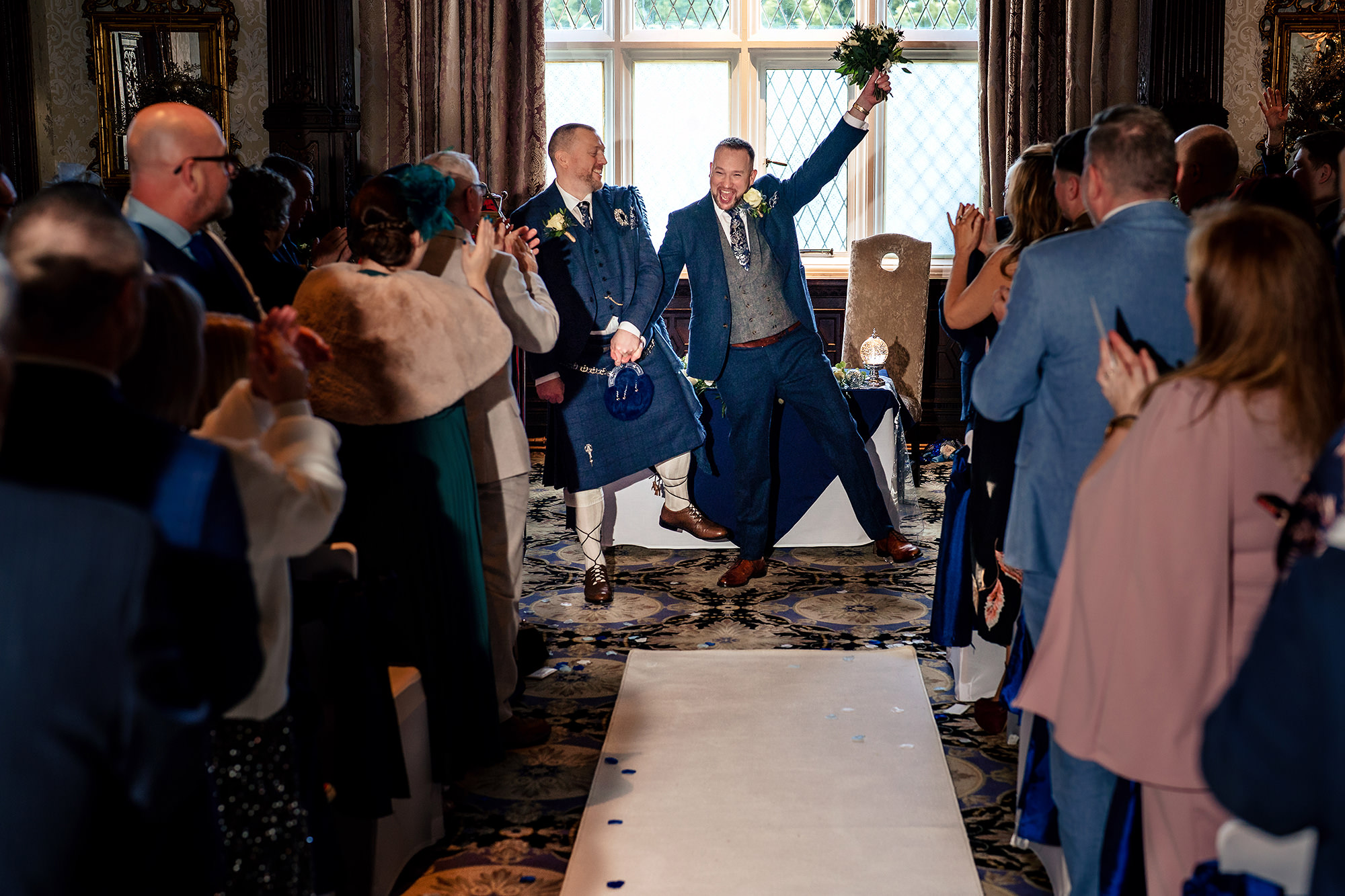 Confetti flying inside the ceremony room straight after John and Neill were pronounced married