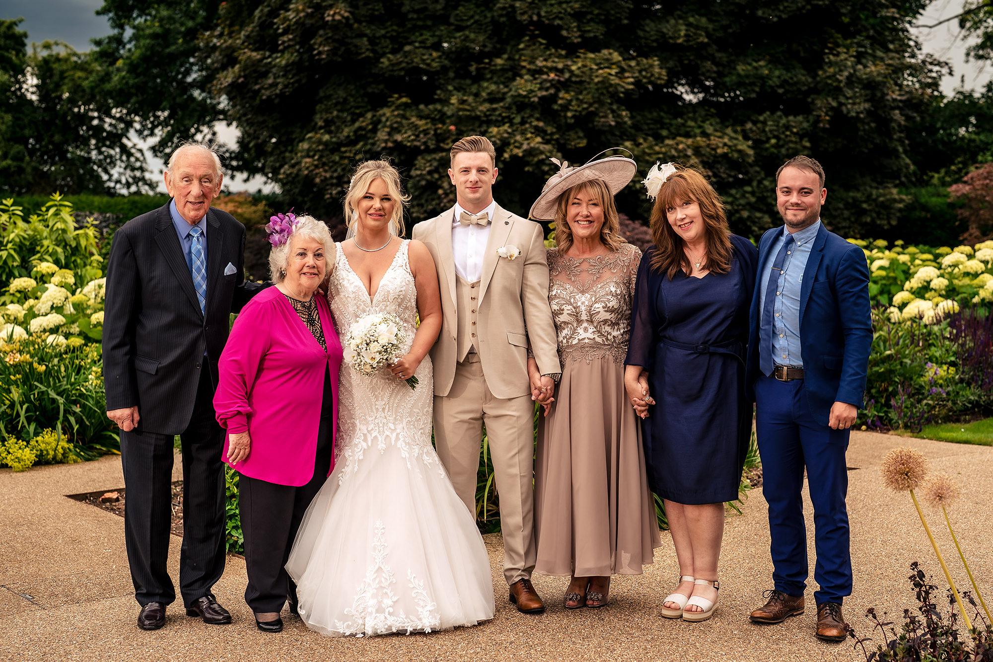 Jess and Cy with extended family in the gardens at Salt House, Staffordshire