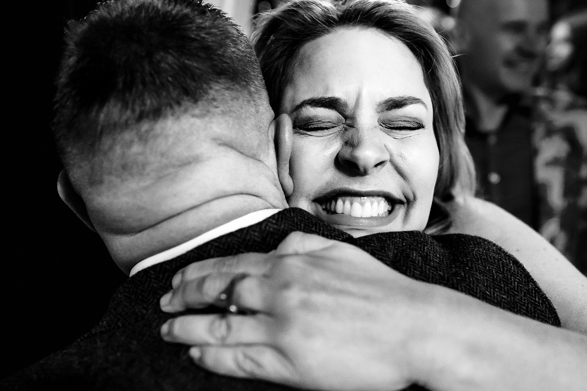 Guests hugging John and Neill as they celebrated becoming married