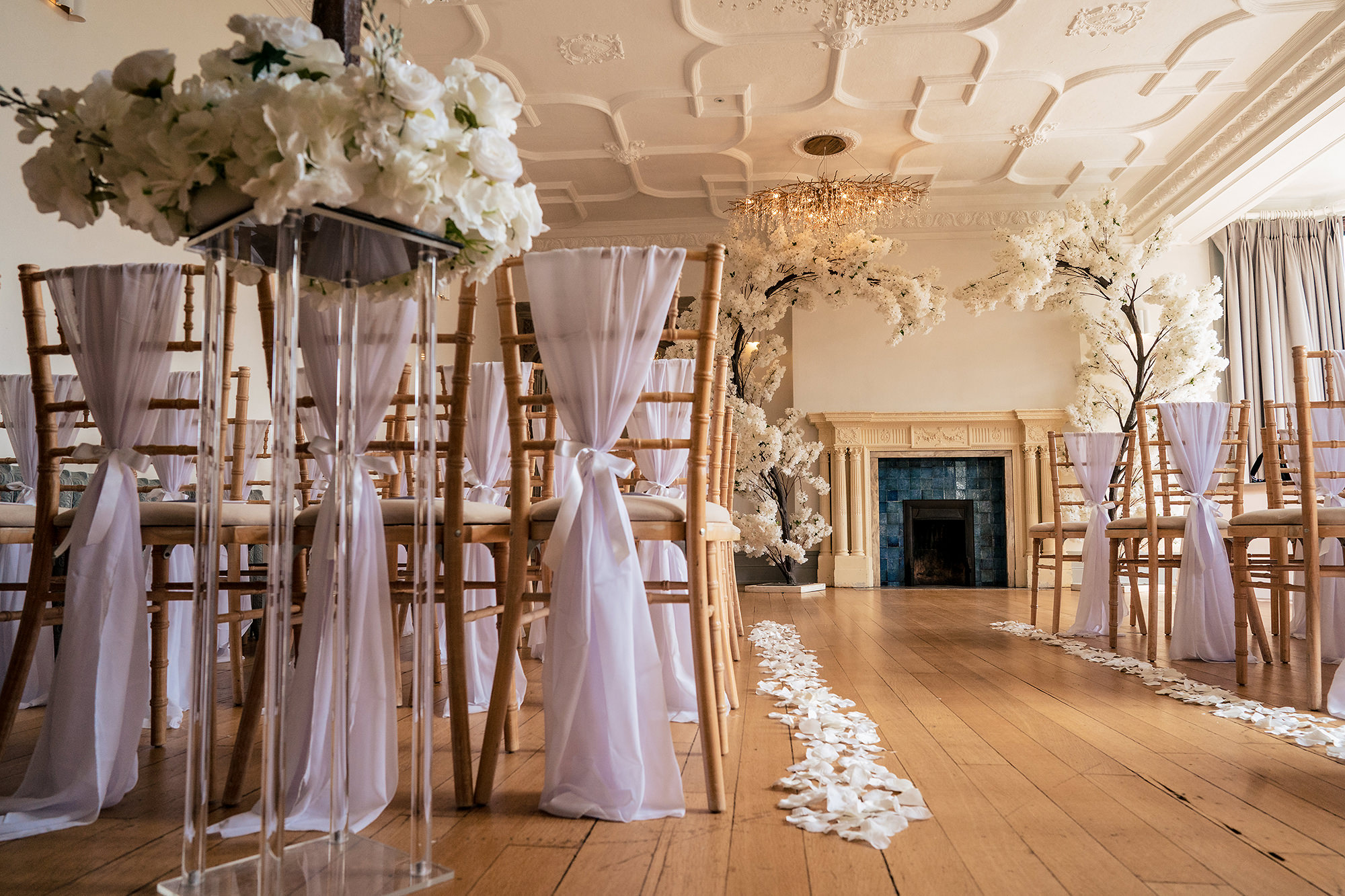 The Salt House ceremony room dressed with draped chairs and petals before guests arrived, Staffordshire wedding photographer