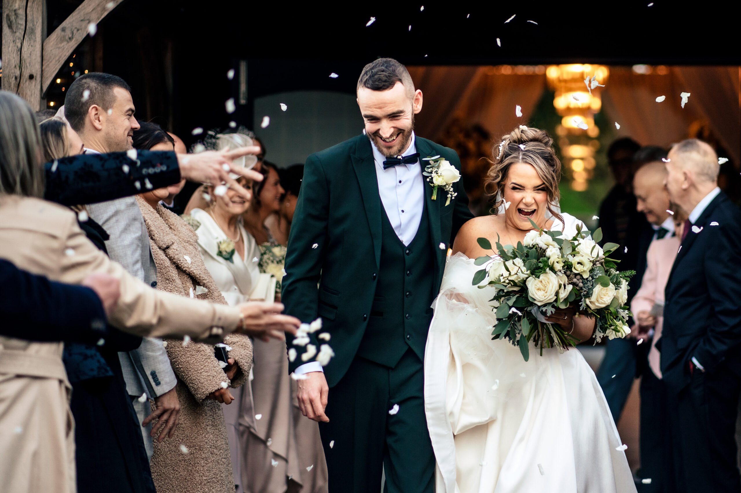 Confetti flying as Georgia and Joe stepped outside Colshaw Hall as newlyweds