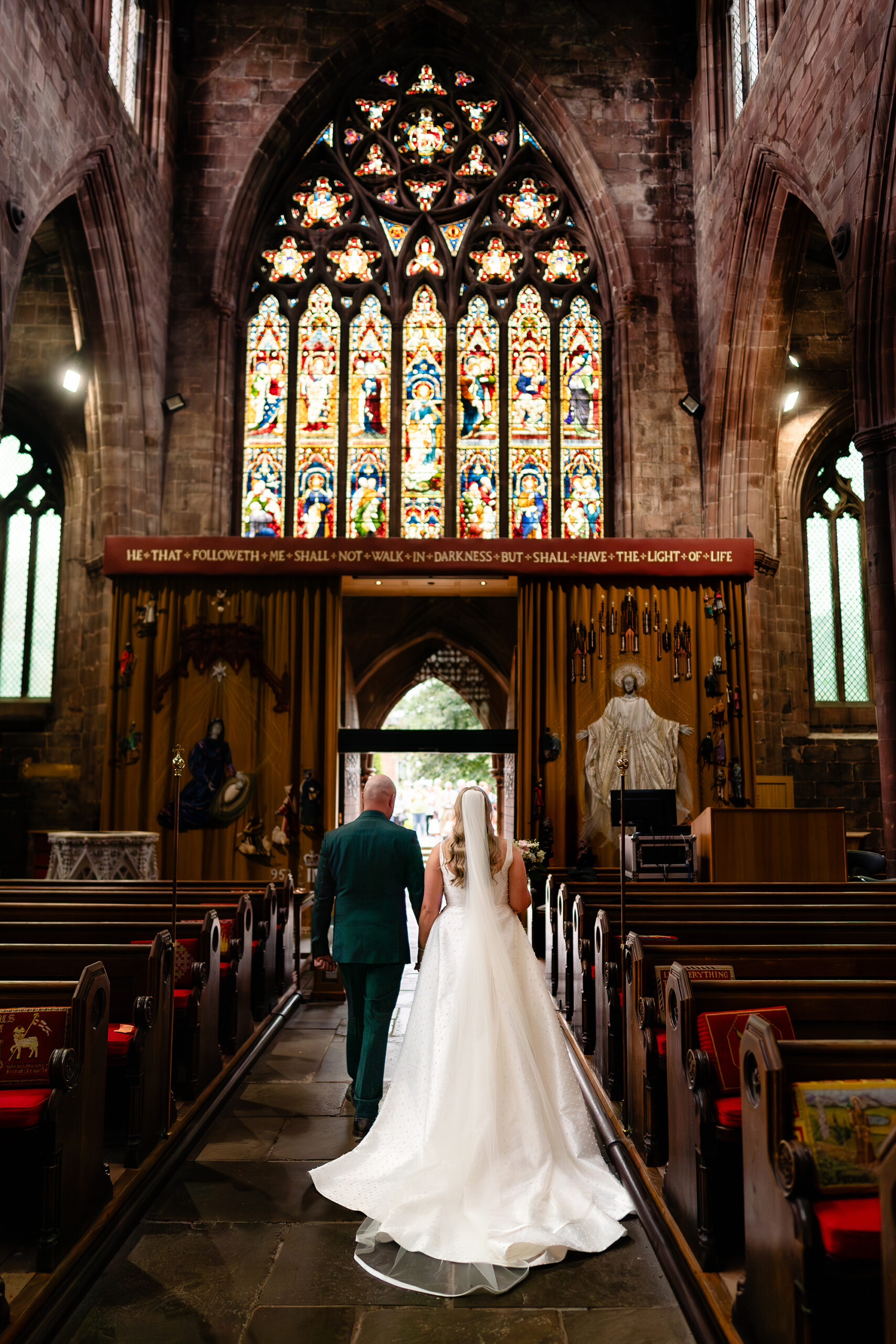 Wide interior shot of St Mary’s Church as Chloe and Pete walk back down the aisle together
