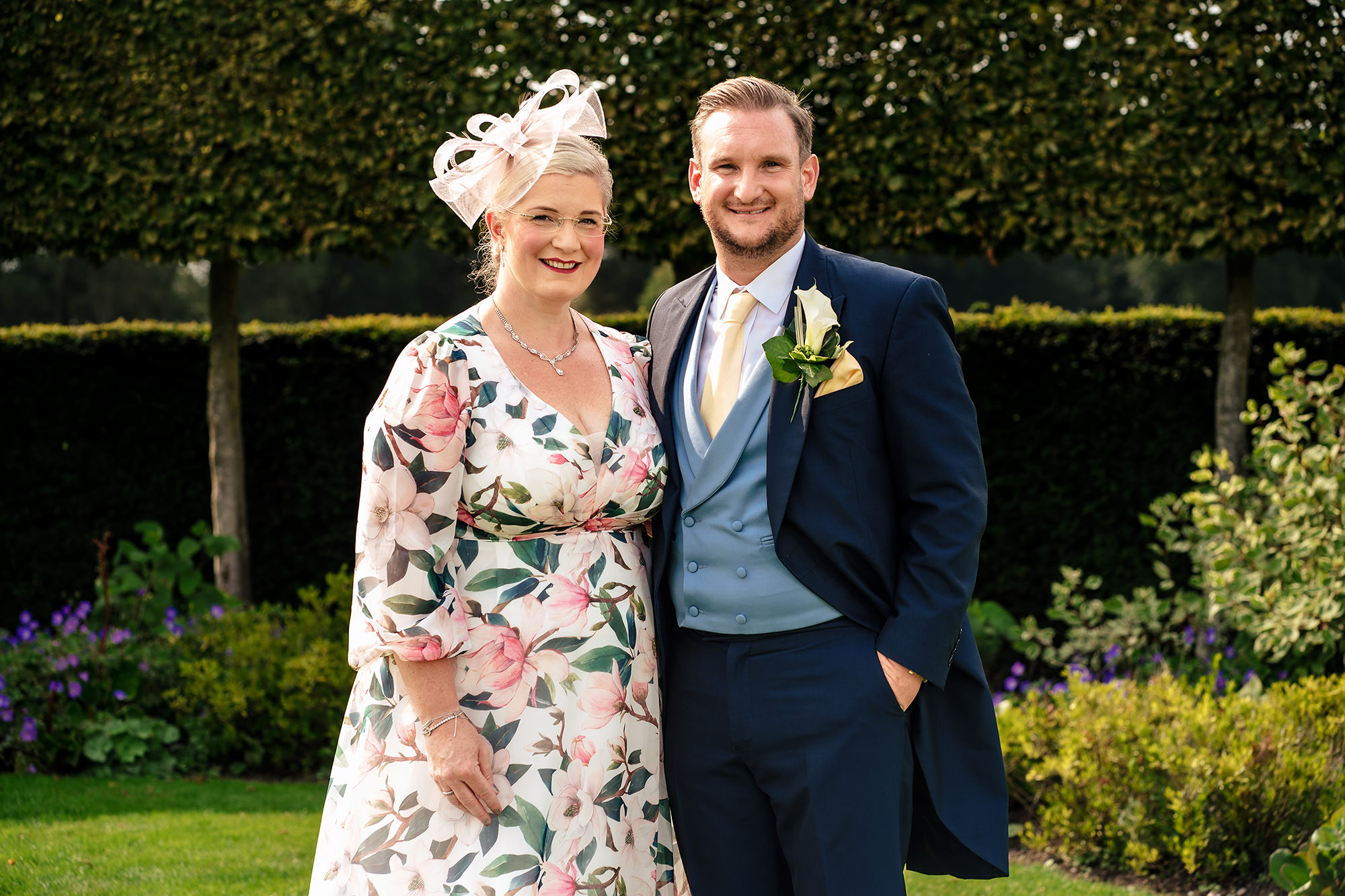 Laura and Ryan posed with one of the bridesmaids, Merrydale Manor wedding photographer