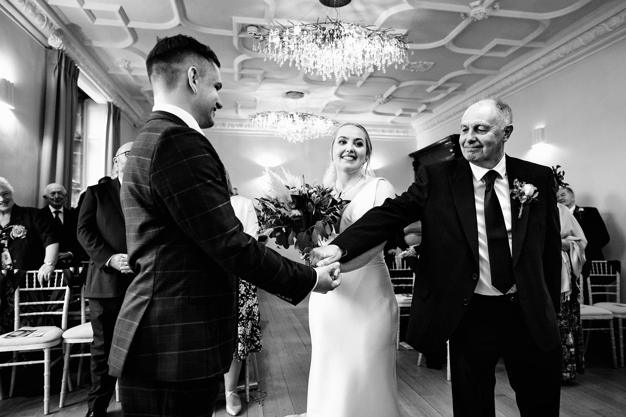 Chloe’s dad handing her over during the Salt House ceremony