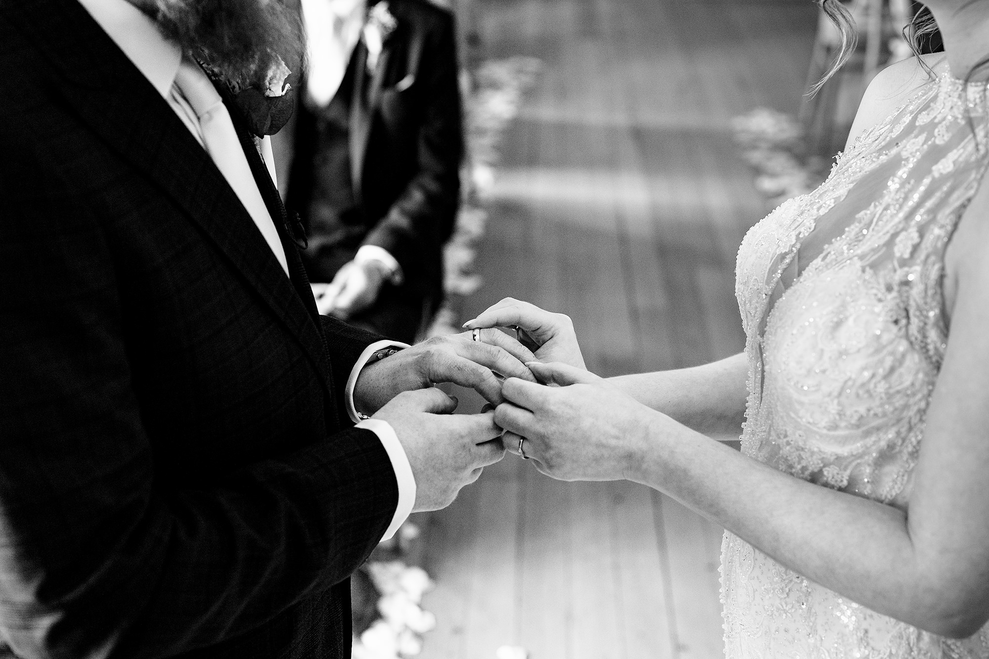 Patrick and Laurel exchanging vows, black and white, Salt House wedding photographer