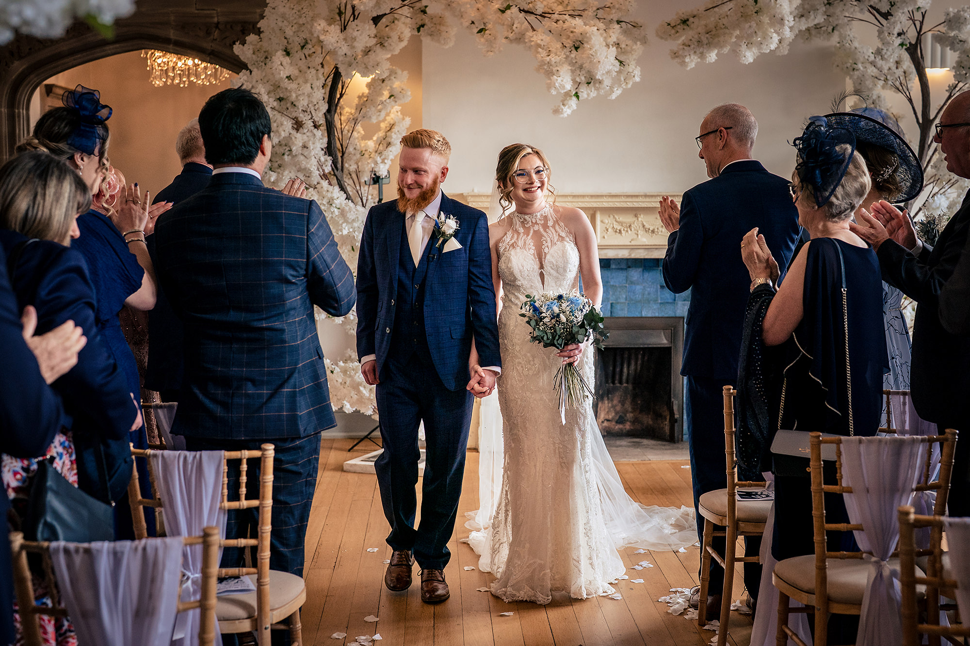 Newlyweds walking back down the aisle as a married couple, Salt House wedding photographer
