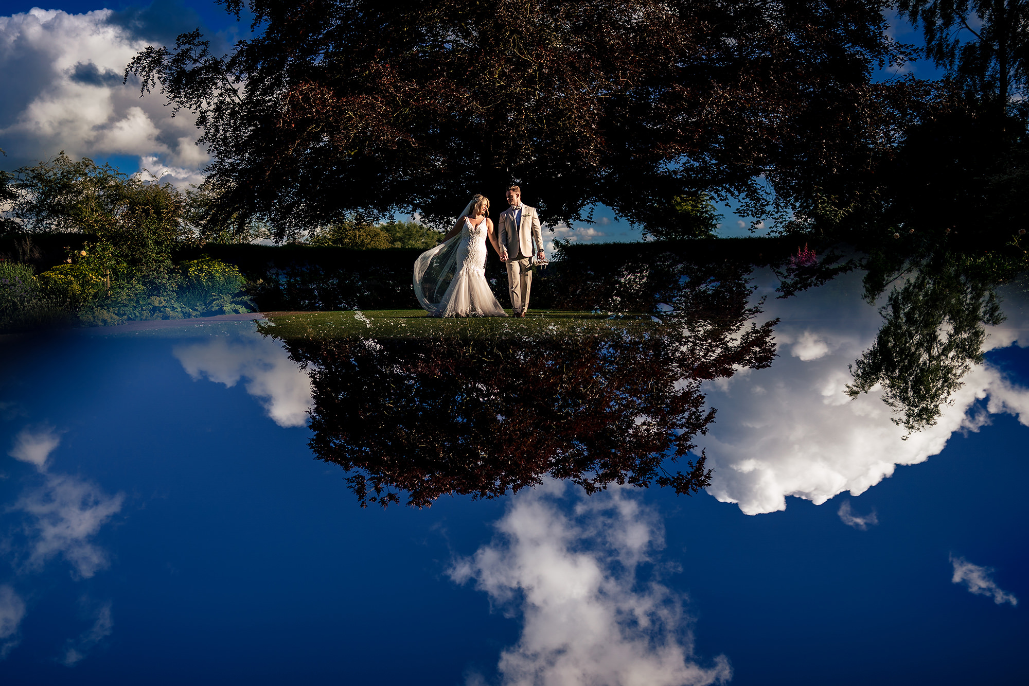 Jess and Cy captured in one of Helen’s signature mirror reflection portraits at Salt House, Staffordshire wedding photographer
