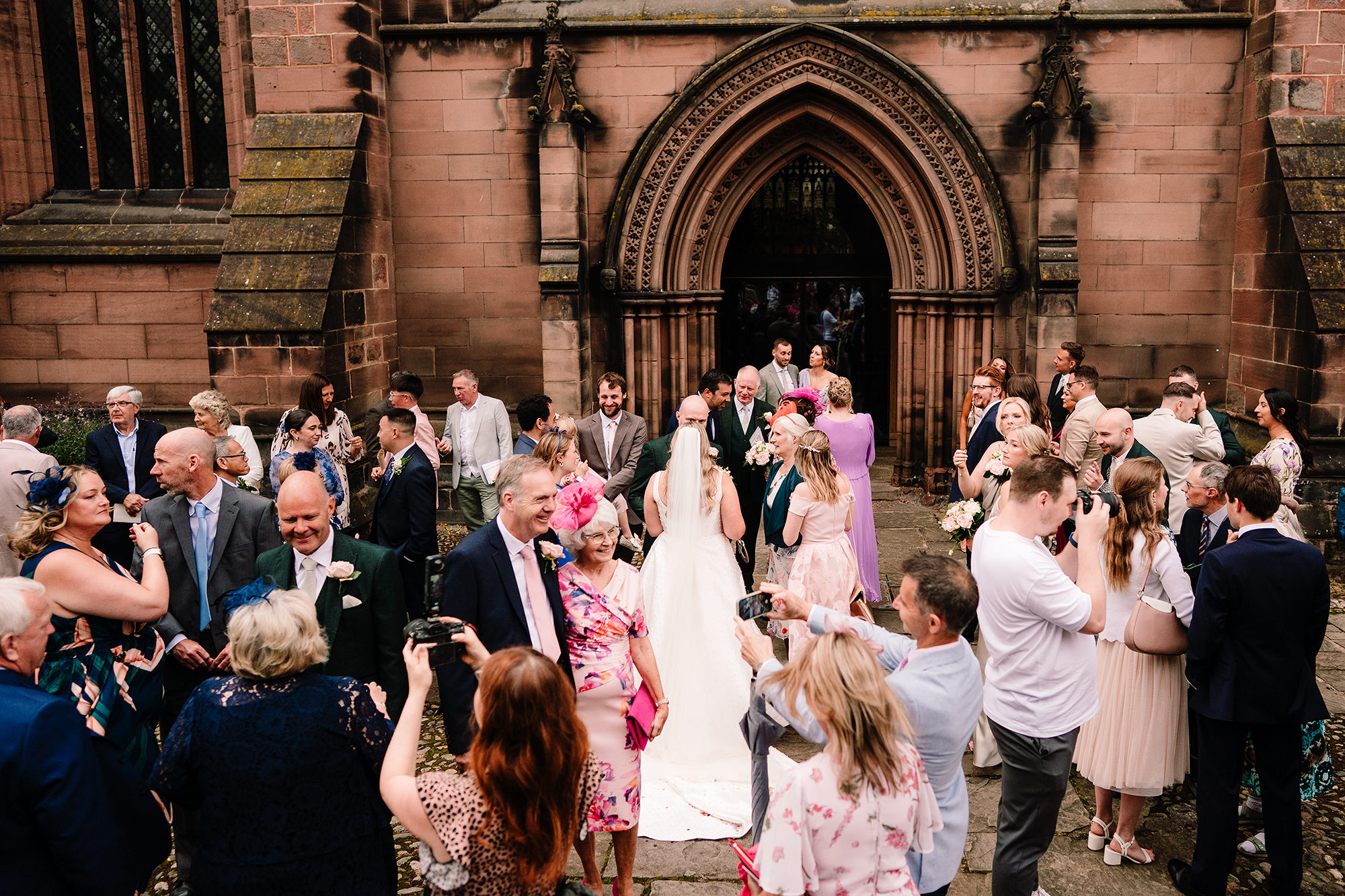 Guests catching up outside St Mary’s Church after the ceremony
