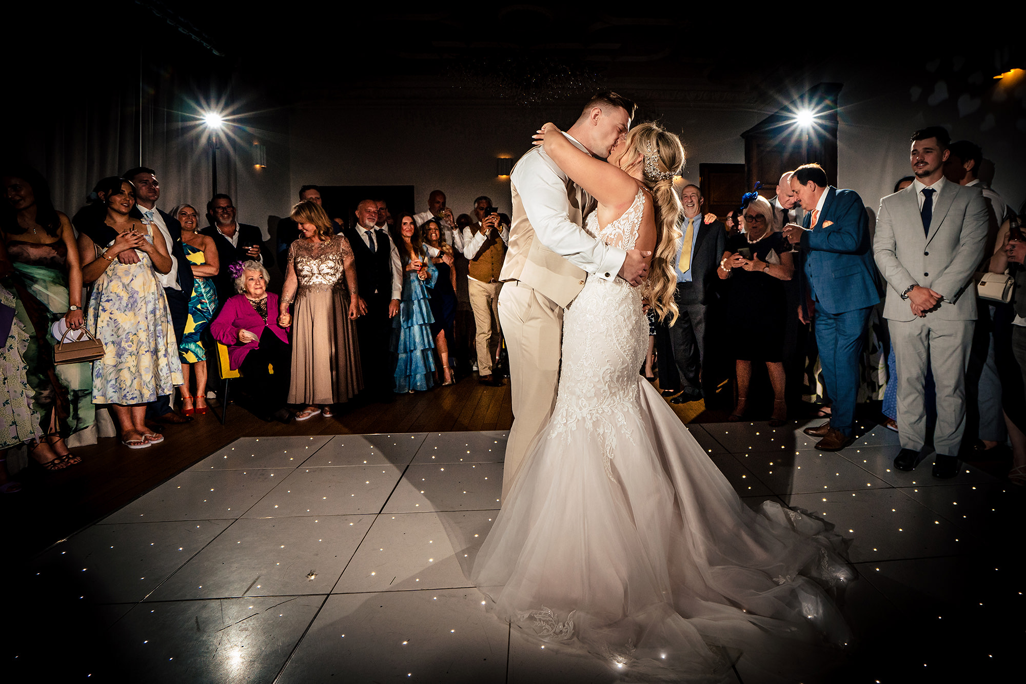 Jess and Cy’s first dance on the sparkling dance floor at Salt House, Staffordshire