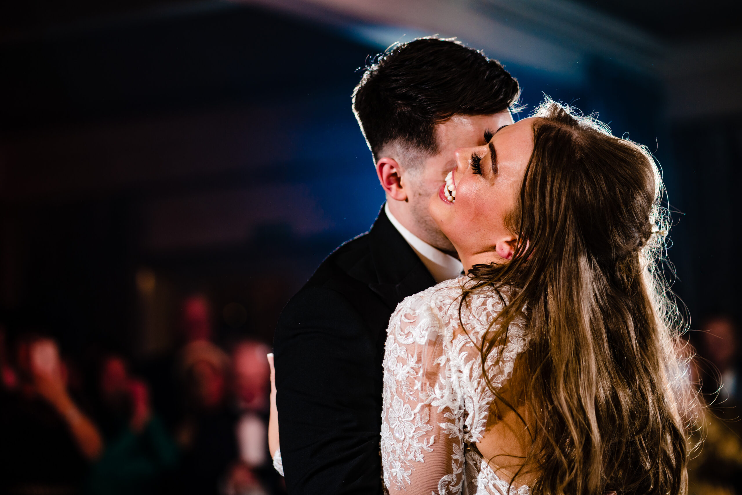 Jamie kissing Abbie during their first dance, Merrydale Manor wedding photographer