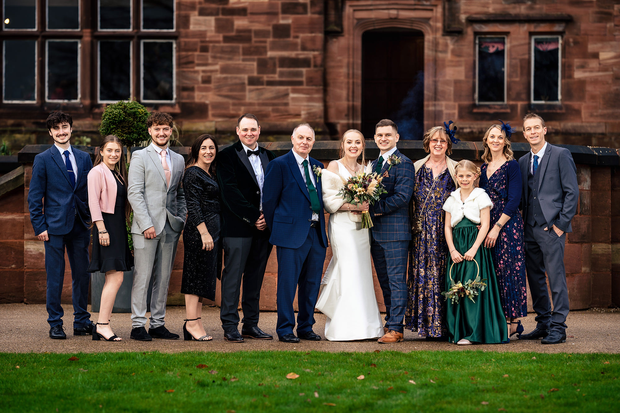 A family group photo at Chloe and Dan’s Salt House wedding