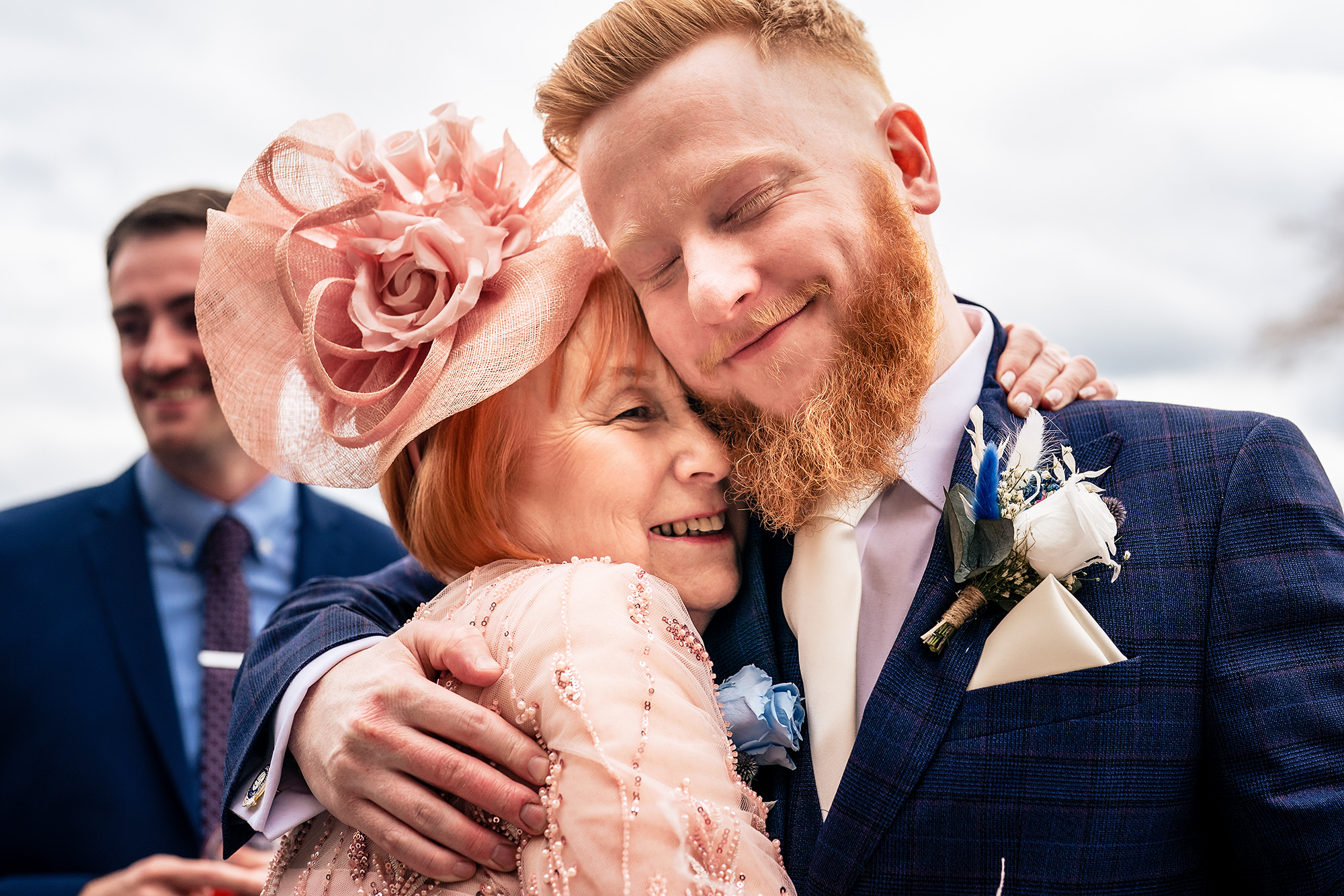 Groom sharing an emotional hug with his mum after the ceremony, Salt House wedding photographer