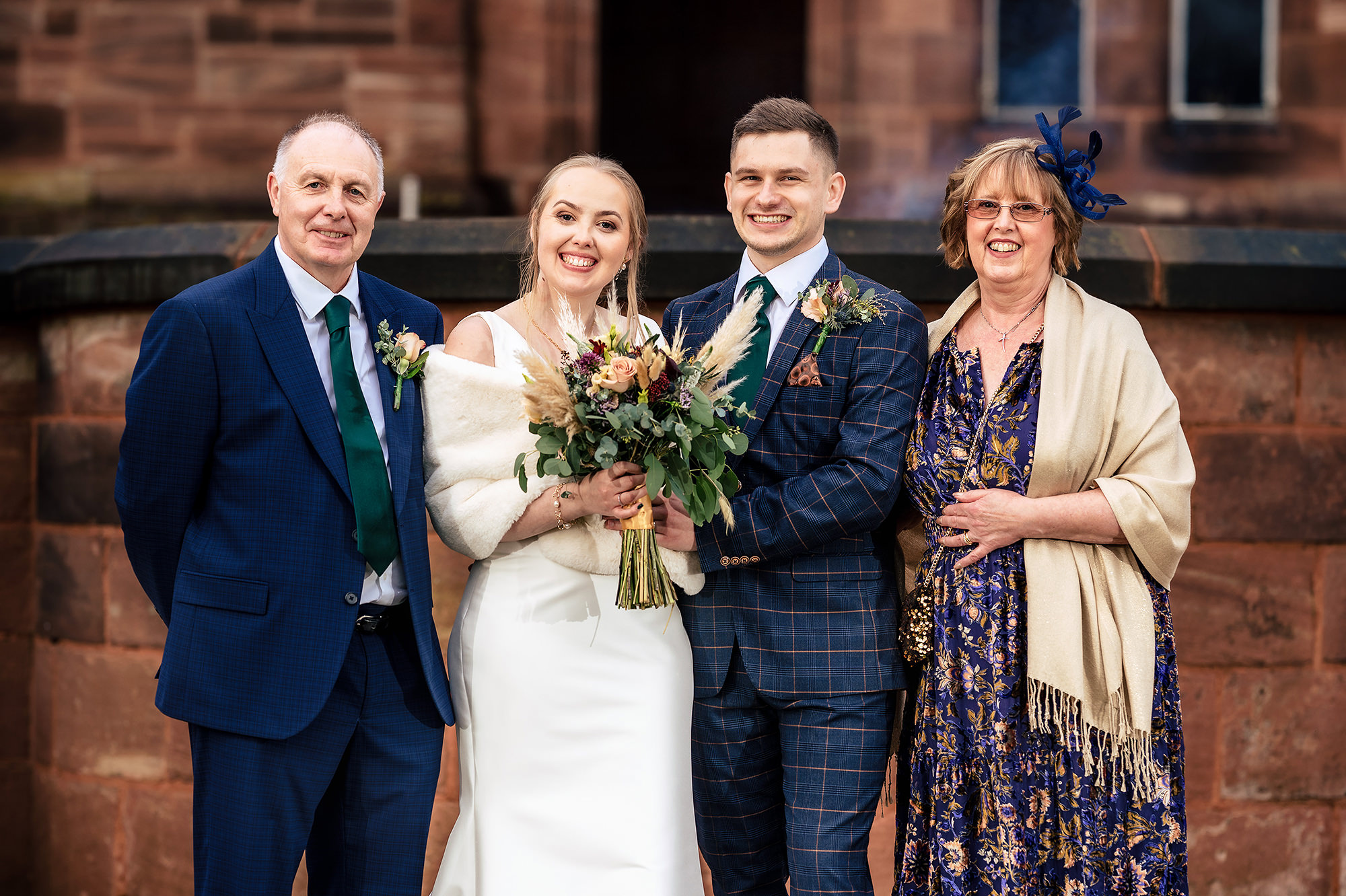 Chloe and Dan with family after their Salt House ceremony