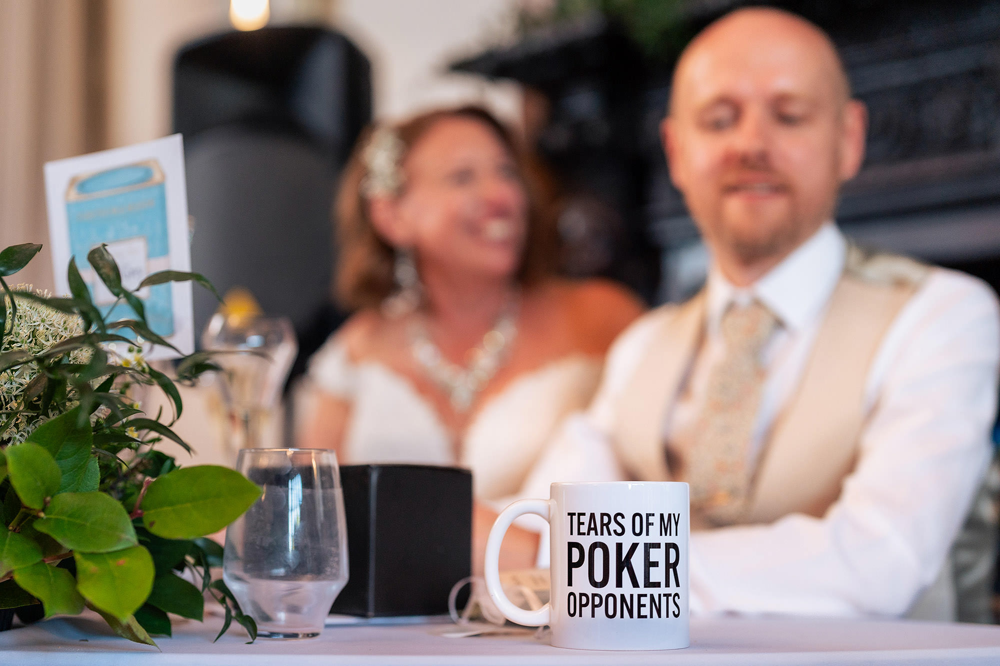 Guests laughing at the top table during the speeches at a Salt House wedding