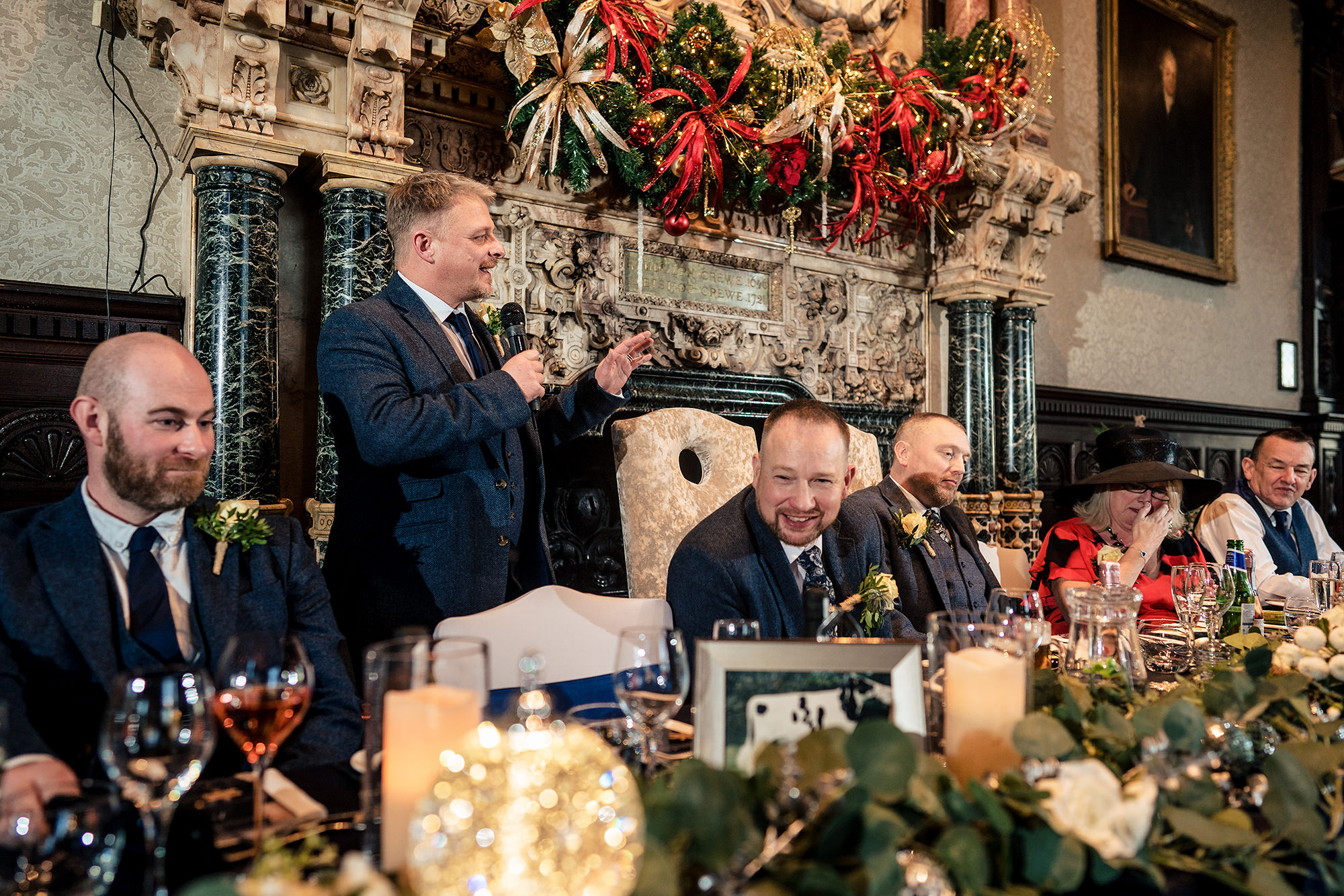 One of the speeches being given at the top table during the wedding breakfast