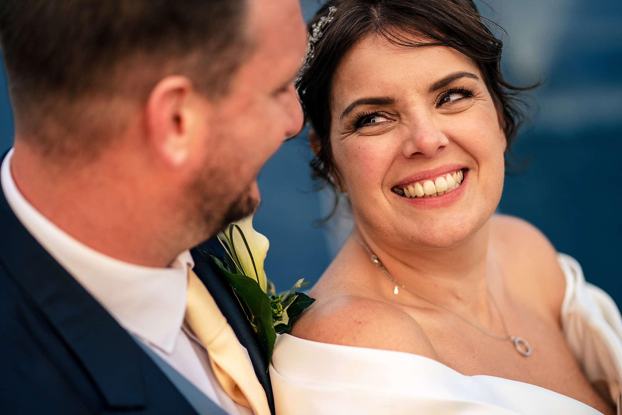 Laura glancing back at Ryan with a smile during their portraits together, Merrydale Manor wedding photographer