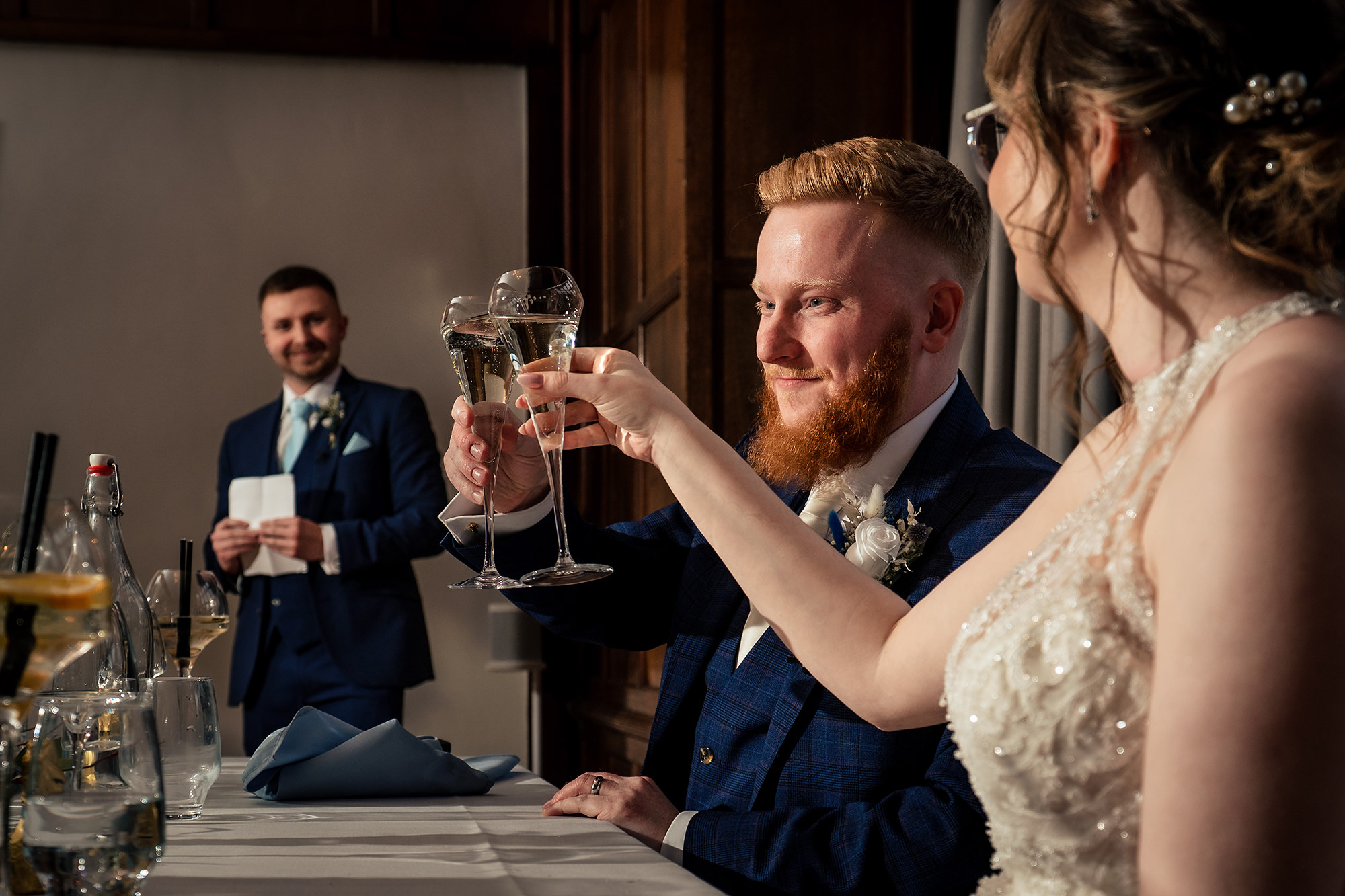 Guests toasting with champagne during the drinks reception at Salt House, Staffordshire wedding photographer
