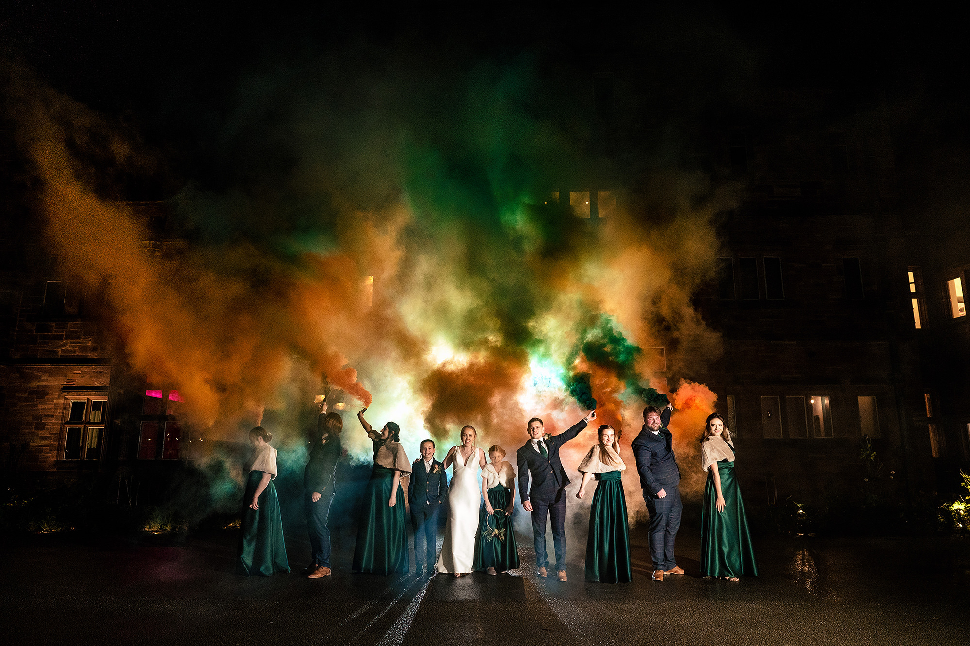 Coloured smoke bombs at the front of Salt House for a set of night portraits