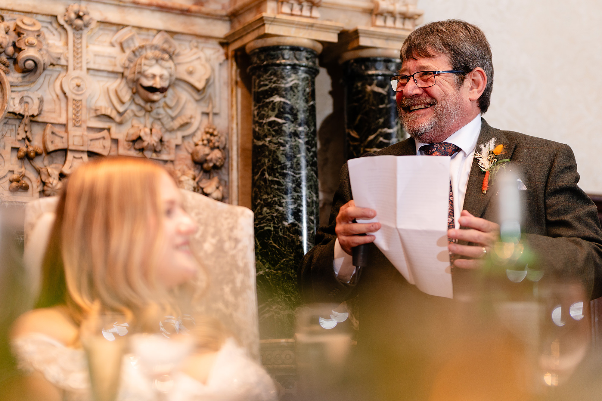 Annie’s dad giving his speech by the carved fireplace at Crewe Hall, Cheshire wedding photographer