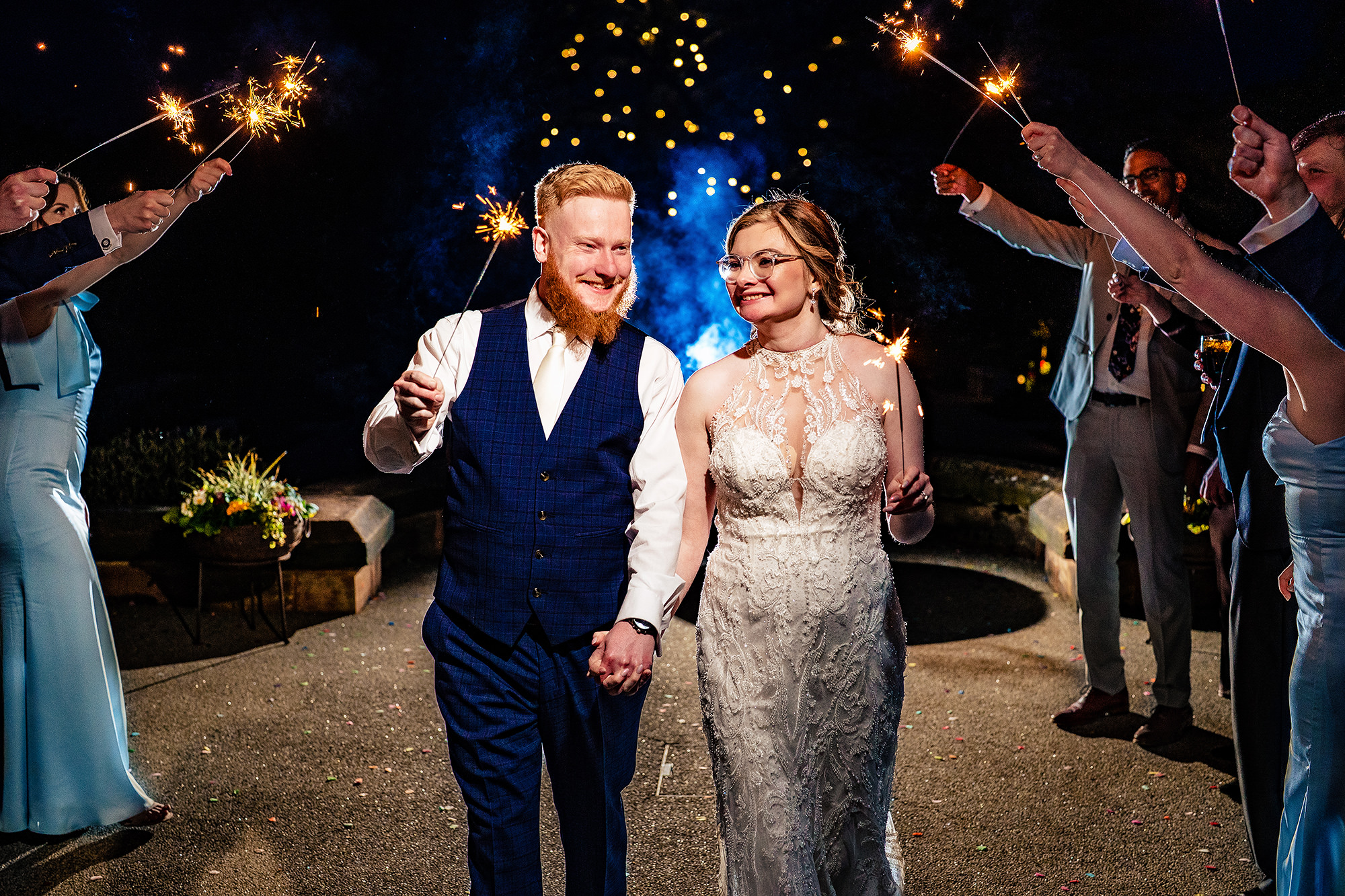 Patrick and Laurel walking through a sparkler send off at the end of the night, Salt House wedding photographer