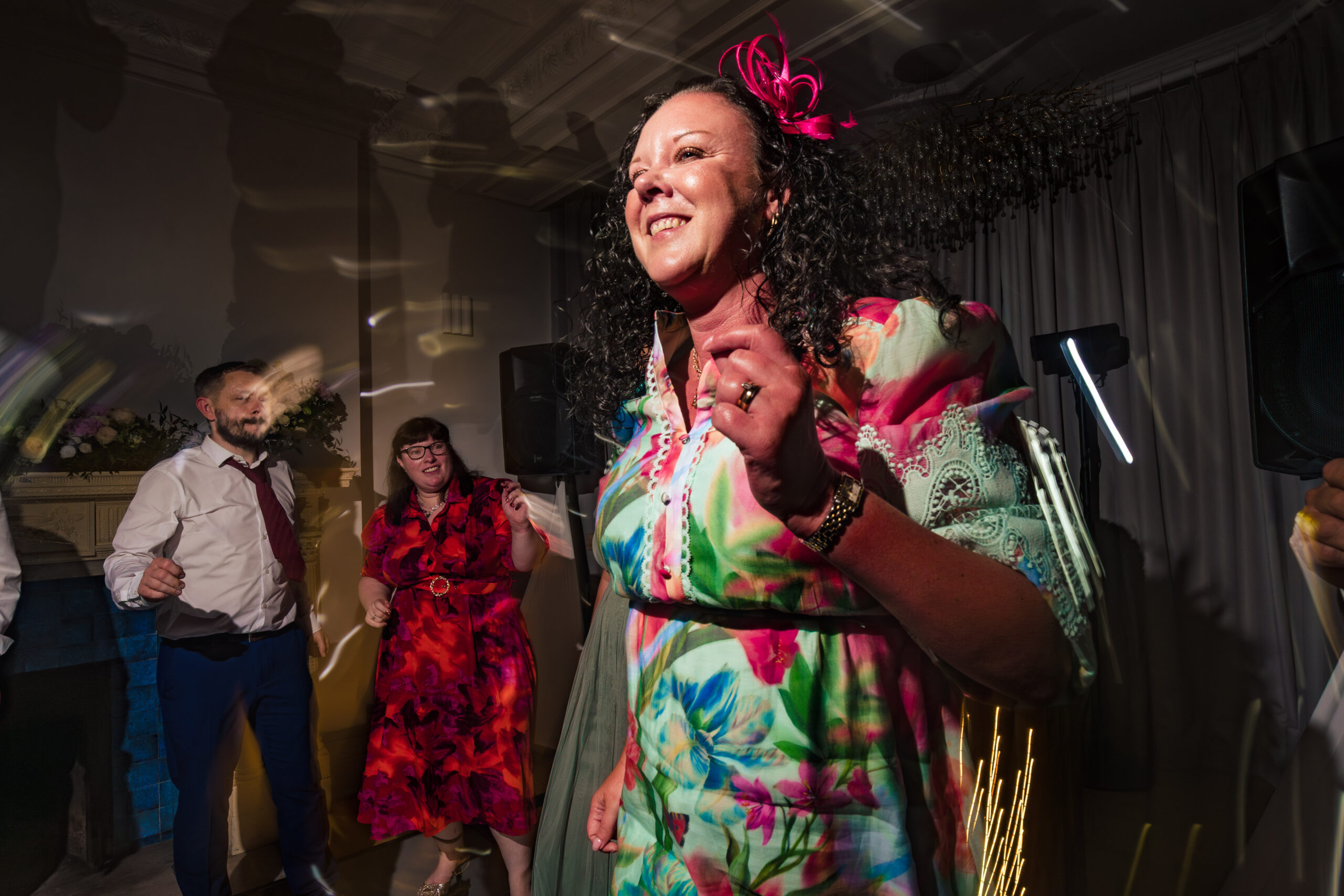 A guest dancing joyfully during the last of the evening celebrations at Salt House