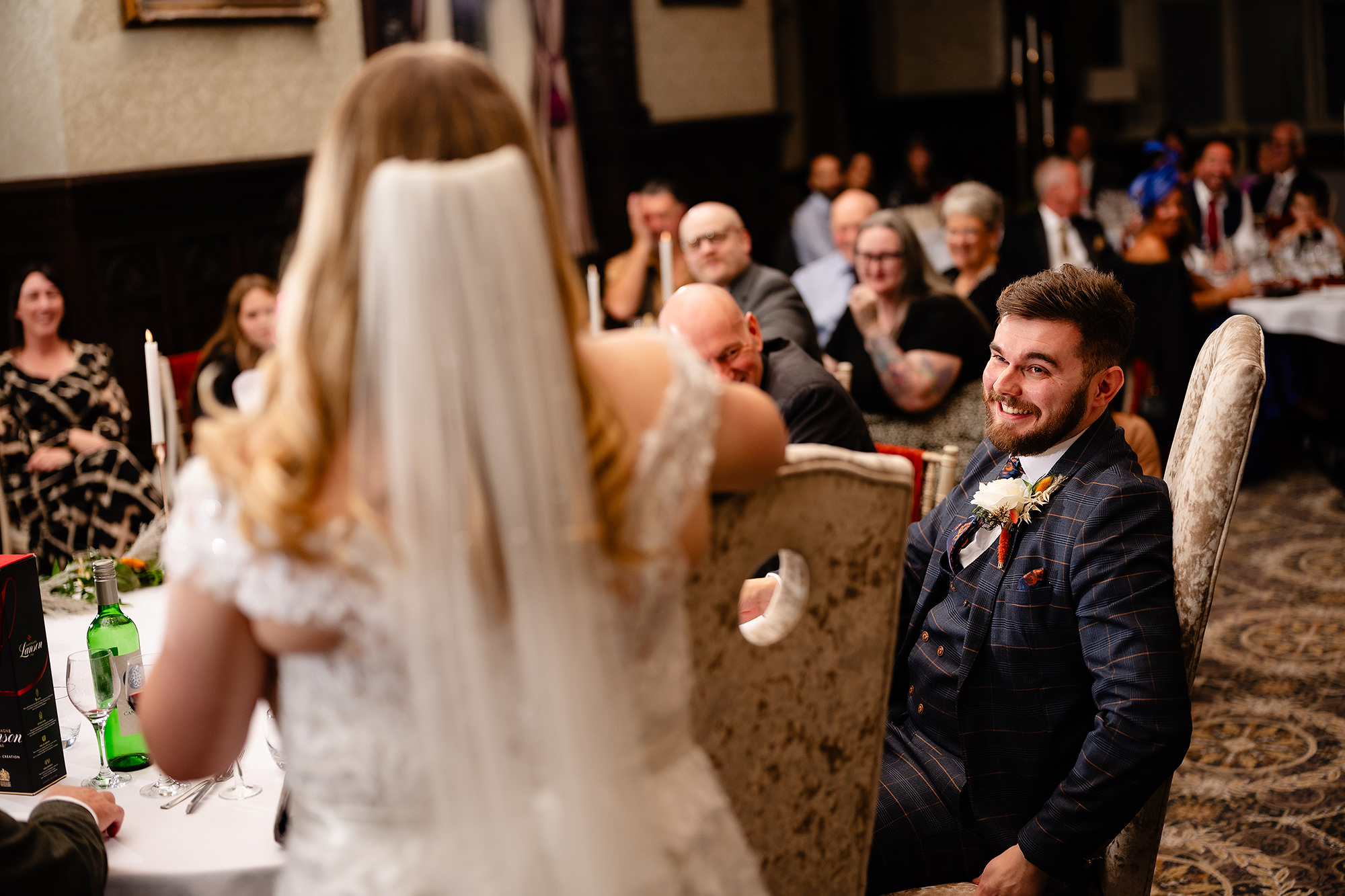 Annie laughing with Tom after the speeches, Crewe Hall wedding photographer