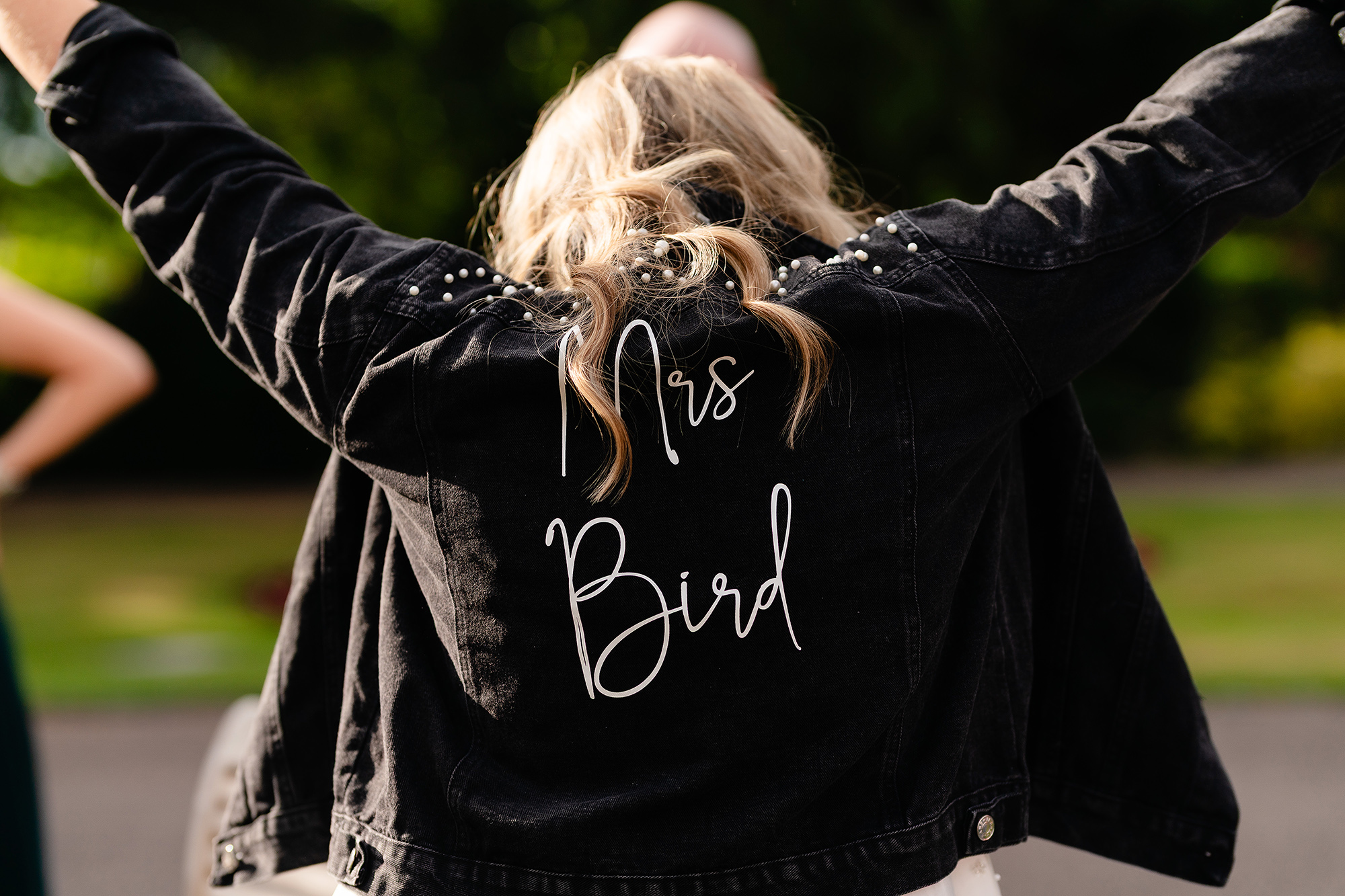 The Mrs Bird lettering on the back of Chloe’s evening jacket