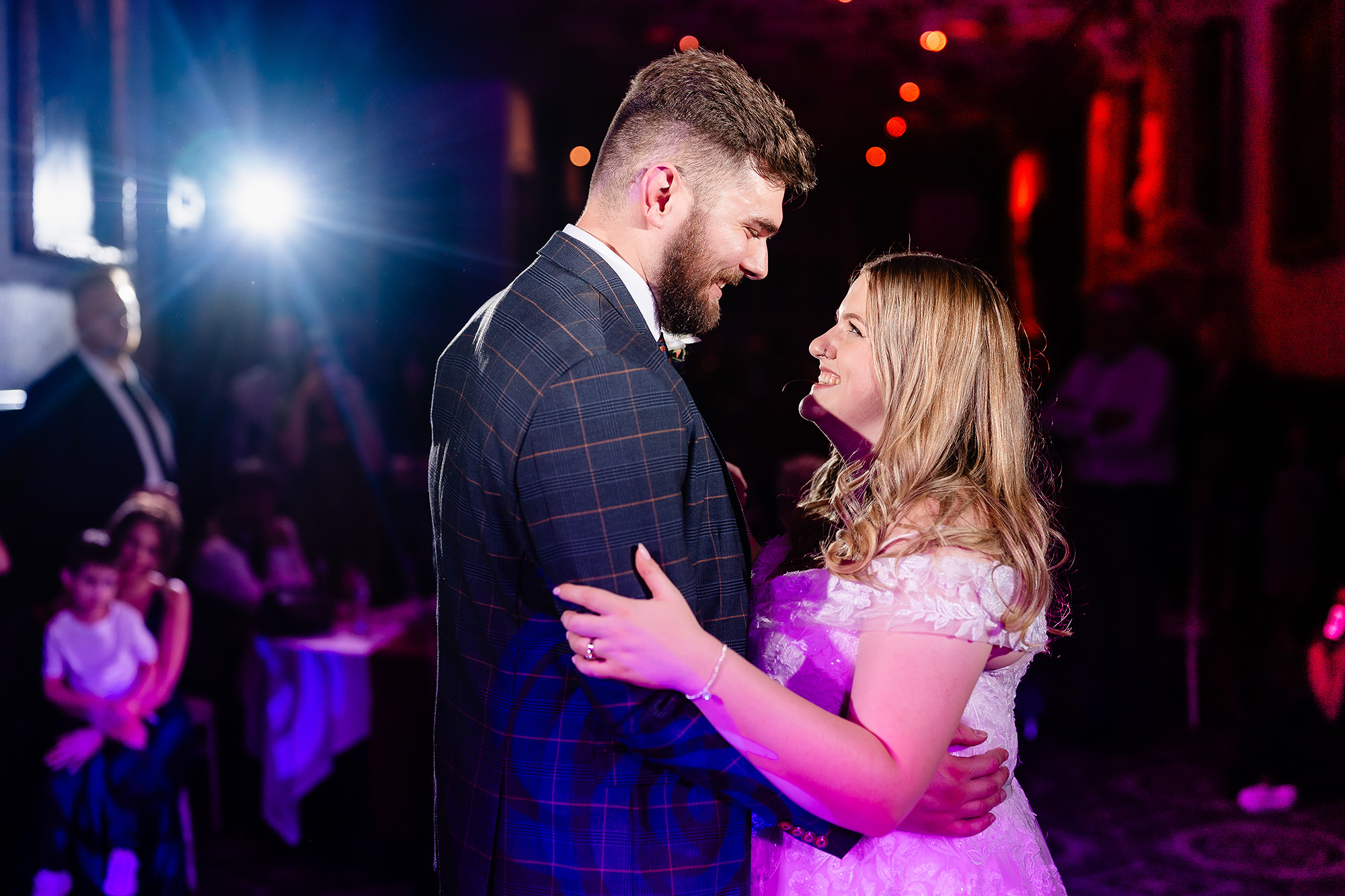 A close embrace between Annie and Tom during their first dance, Crewe Hall wedding photographer