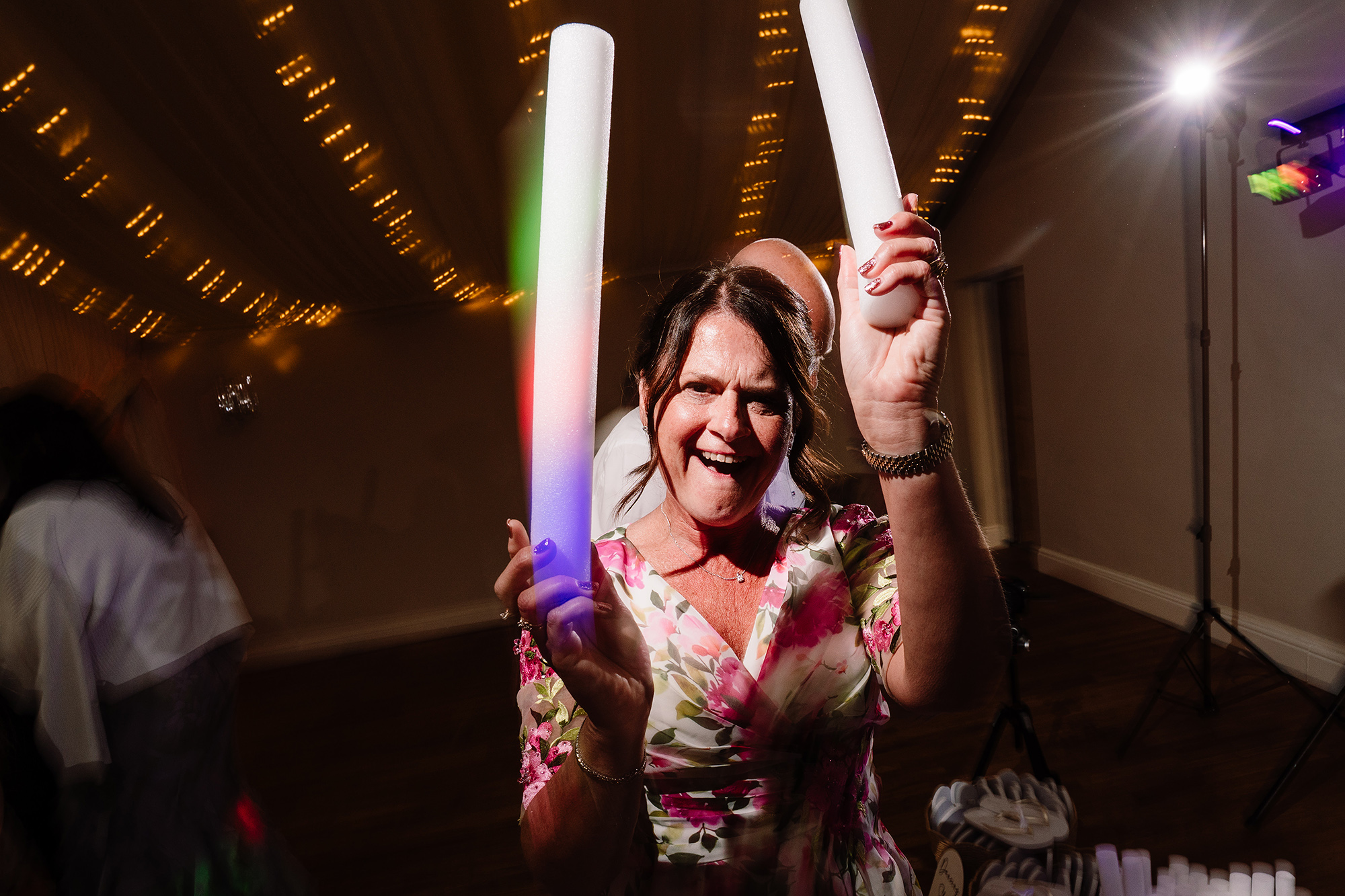 Foam glow sticks lighting up the dancefloor later in the evening